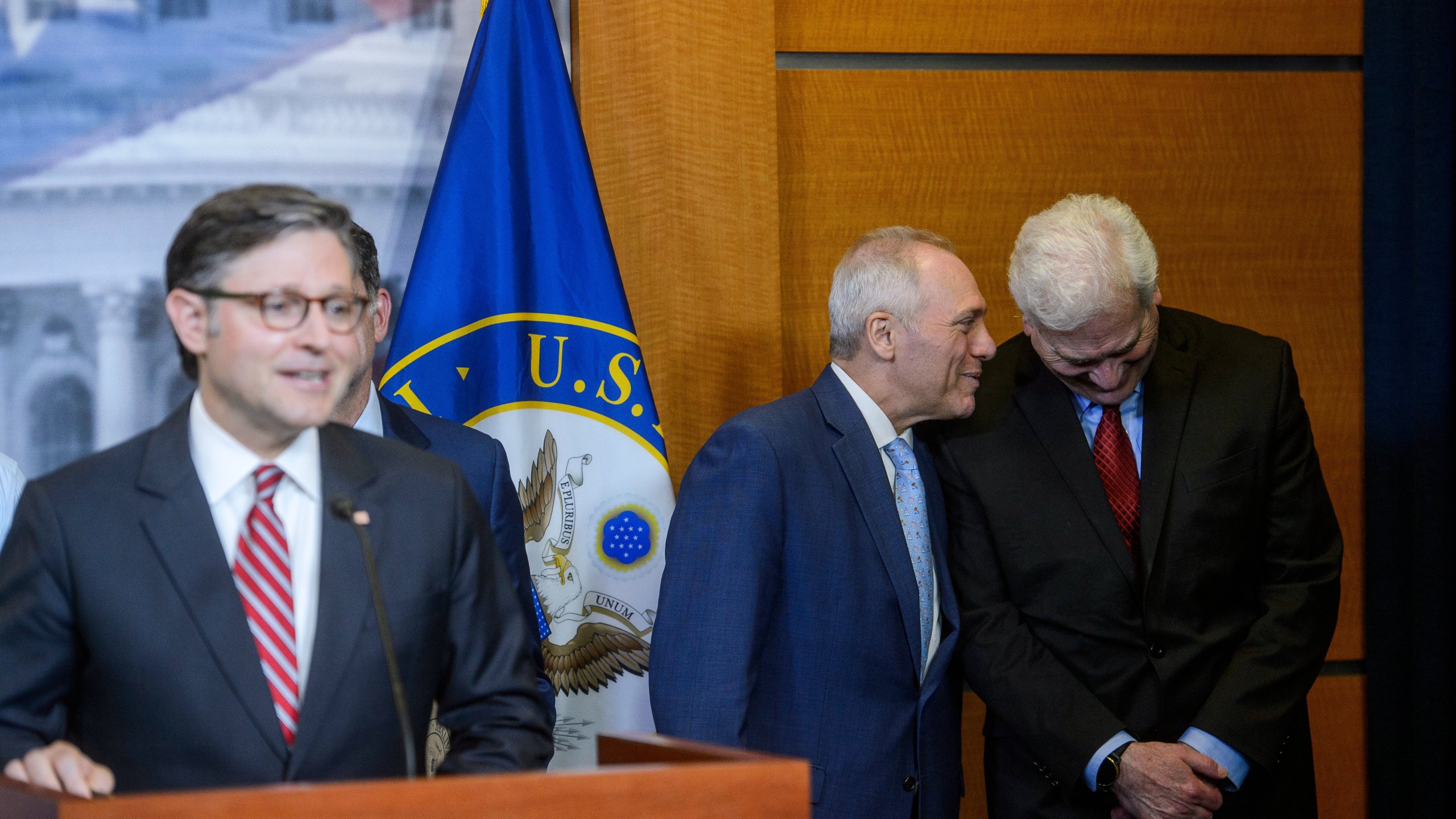 House Majority Leader Steve Scalise, R-La., center, and House Majority Whip Tom Emmer, R-Minn., right, talk as Speaker of the House Mike Johnson, R-La., left, speaks during a news conference at the Capitol, Tuesday, May 20, 2025, in Washington. (AP Photo/Rod Lamkey, Jr.)