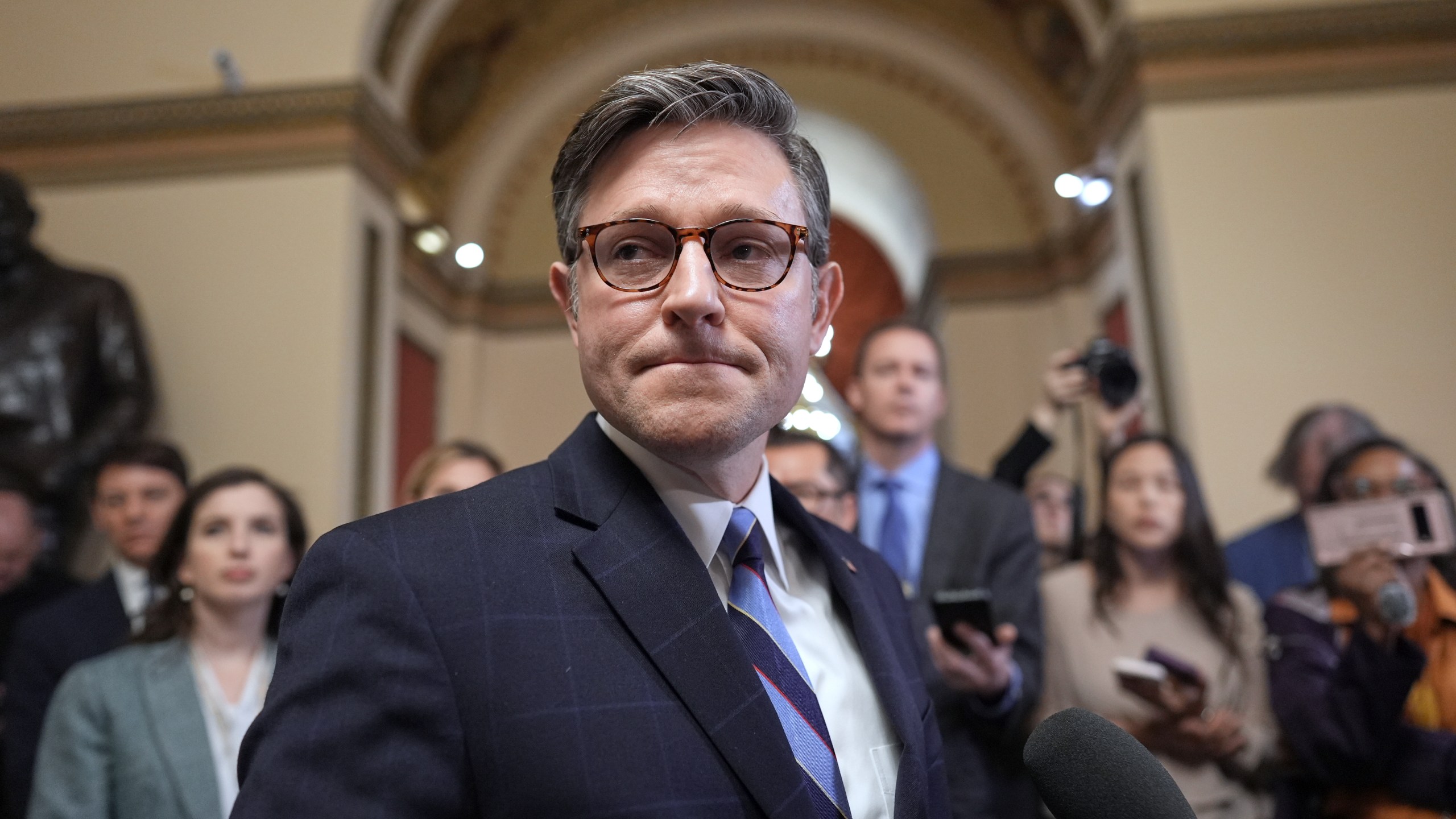 FILE - Speaker of the House Mike Johnson, R-La., talks to reporters just after House Republicans narrowly approved their budget framework, at the Capitol in Washington, April 10, 2025. (AP Photo/J. Scott Applewhite, File)
