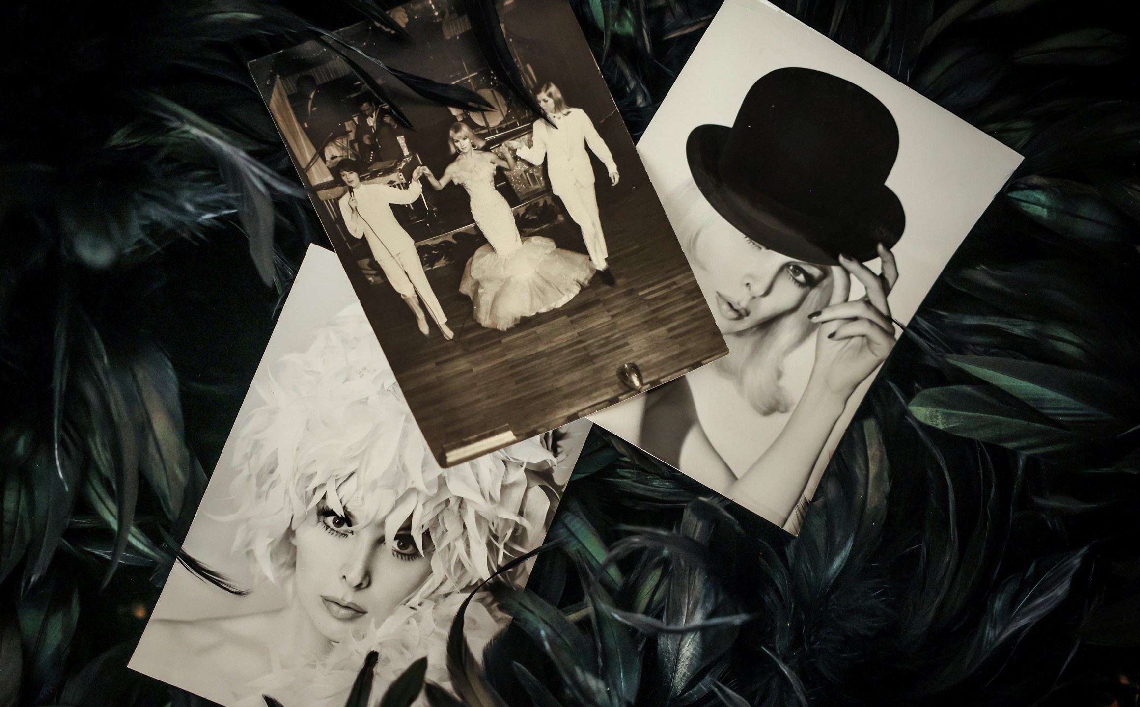 Cabaret photographs of Marie-Pierre Pruvot known as Bambi, one of the first trans women in the world to become a public star, and a pioneer in global LGBTQ+ history, are displayed during an interview with the Associated Press, in Pantin, outside Paris, Thusday, May 20, 2025. (AP Photo/Thomas Padilla)