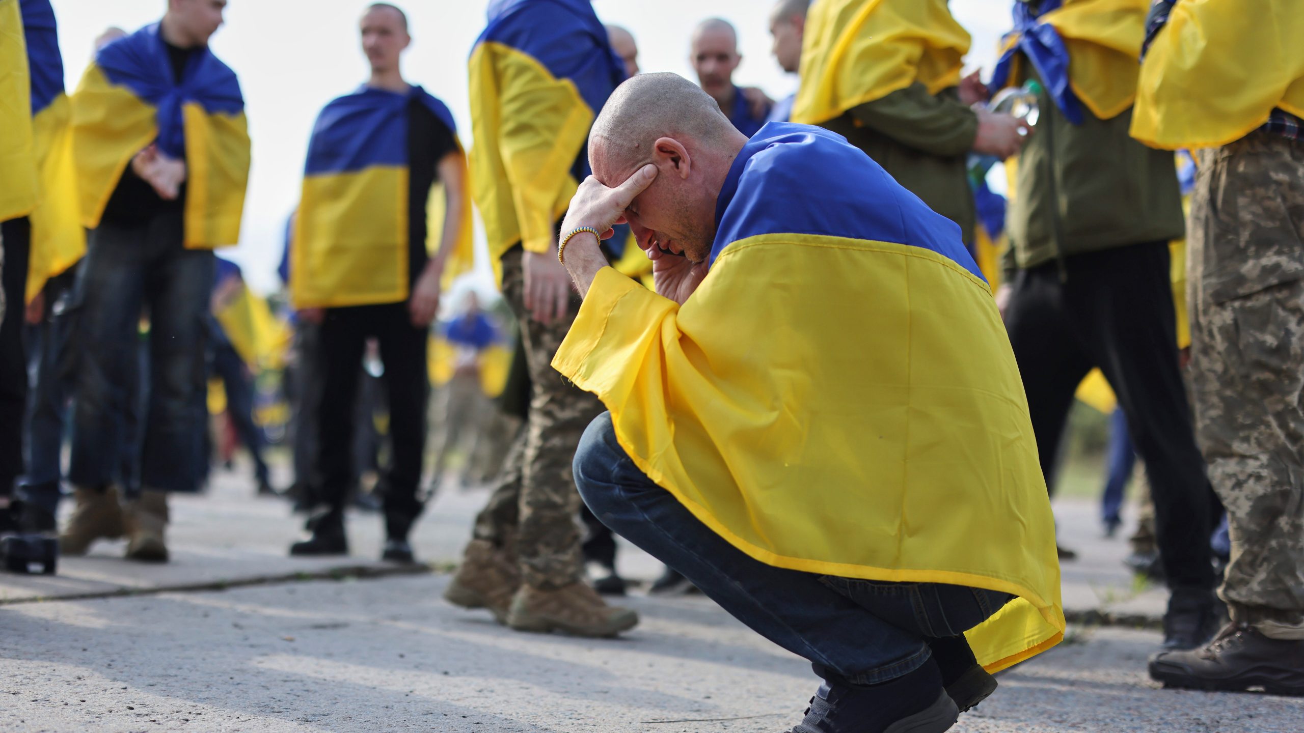 A Ukrainian soldier reacts after returning from captivity following an exchange between Russia and Ukraine, in Chernyhiv region, Ukraine, Friday, May 23, 2025. (AP Photo)