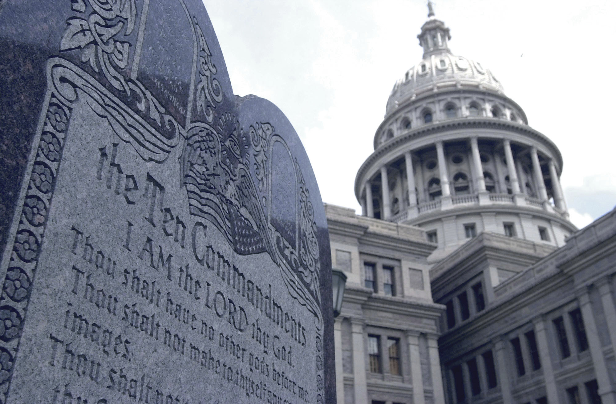 FILE - This 5-foot tall stone slab bearing the Ten Commandments stands near the Capitol in Austin, Texas, in this July 29, 2002 file photo. (AP Photo/Harry Cabluck, File)