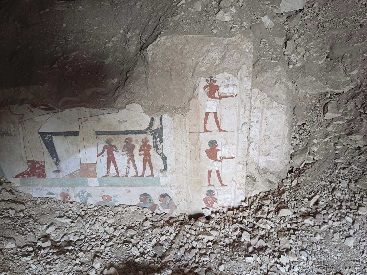 In this undated photo, hieroglyphs are revealed in the three new graves of senior statesmen found in the Dra' Abu al-Naga necropolis area in Luxor, Egypt. (Egypt Ministry of Tourism and Antiquities via AP)