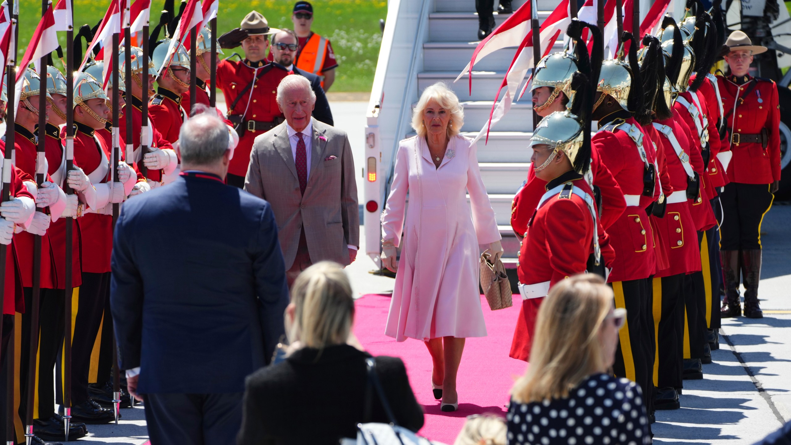 King Charles and Queen Camilla arrive at the Ottawa International Airport in Ottawa, Canada, for a royal visit on Monday, May 26, 2025. (Sean Kilpatrick/The Canadian Press via AP)