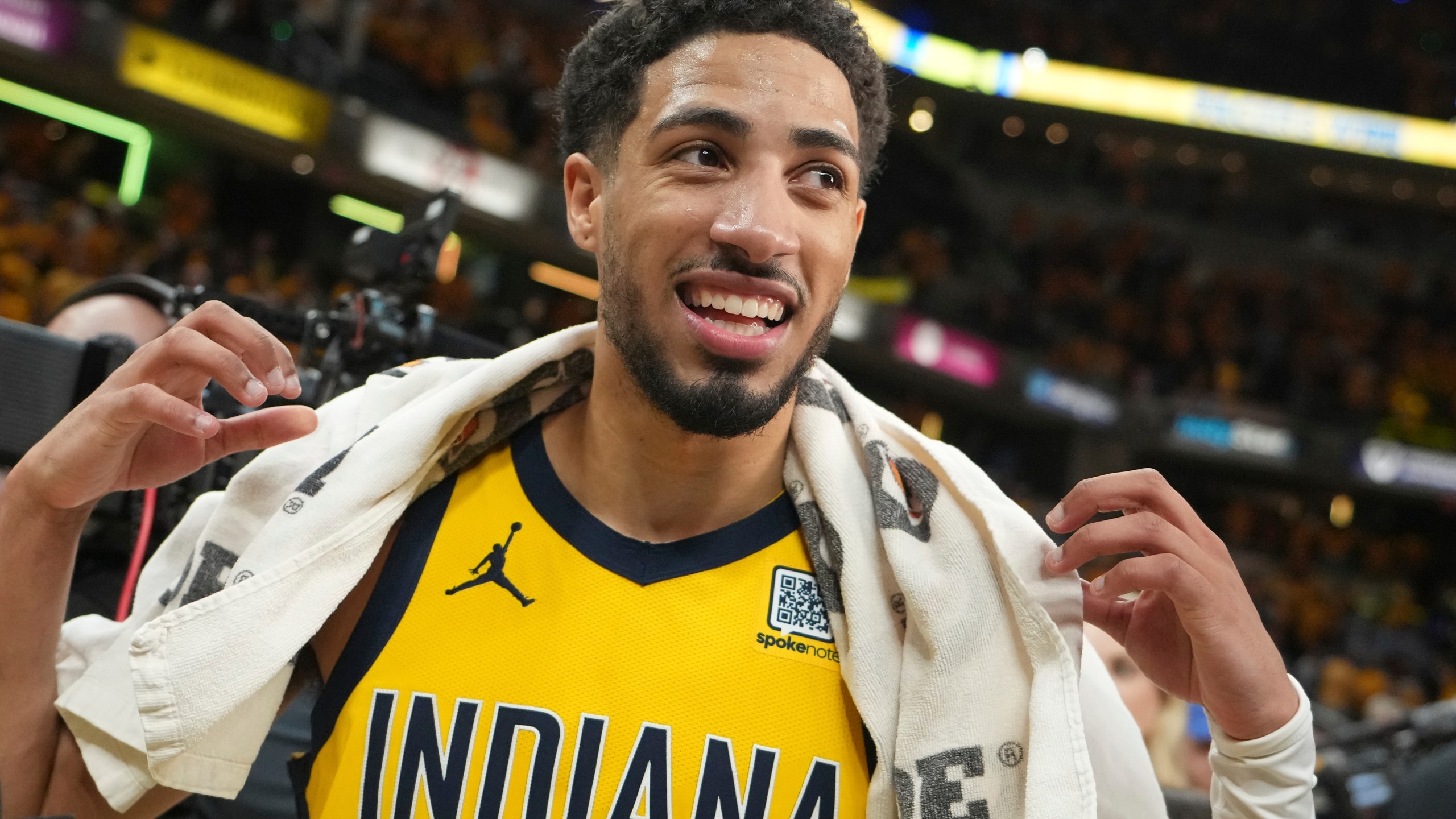 Indiana Pacers guard Tyrese Haliburton (0) celebrates the team's win after Game 4 of the Eastern Conference finals of the NBA basketball playoffs against the New York Knicks in Indianapolis, Tuesday, May 27, 2025. (AP Photo/Michael Conroy)