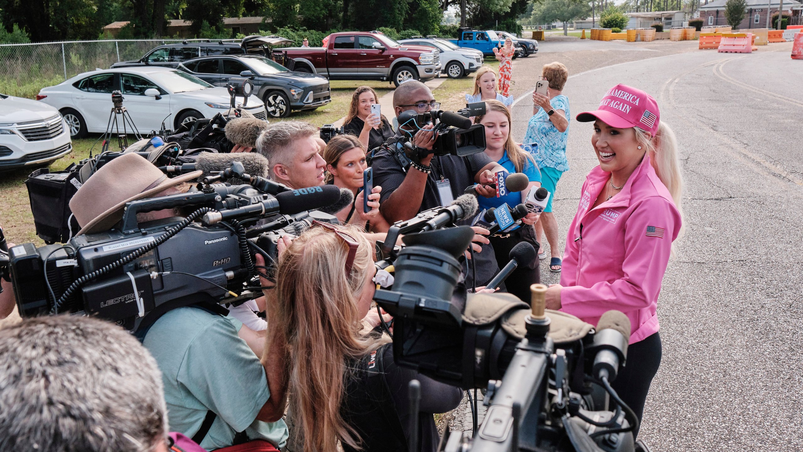 Savannah Chrisley, daughter of reality television star Todd Chrisley, speaks outside the Federal Prison Camp, Wednesday, May 28, 2025, in Pensacola, Fla. (AP Photo/Dan Anderson)