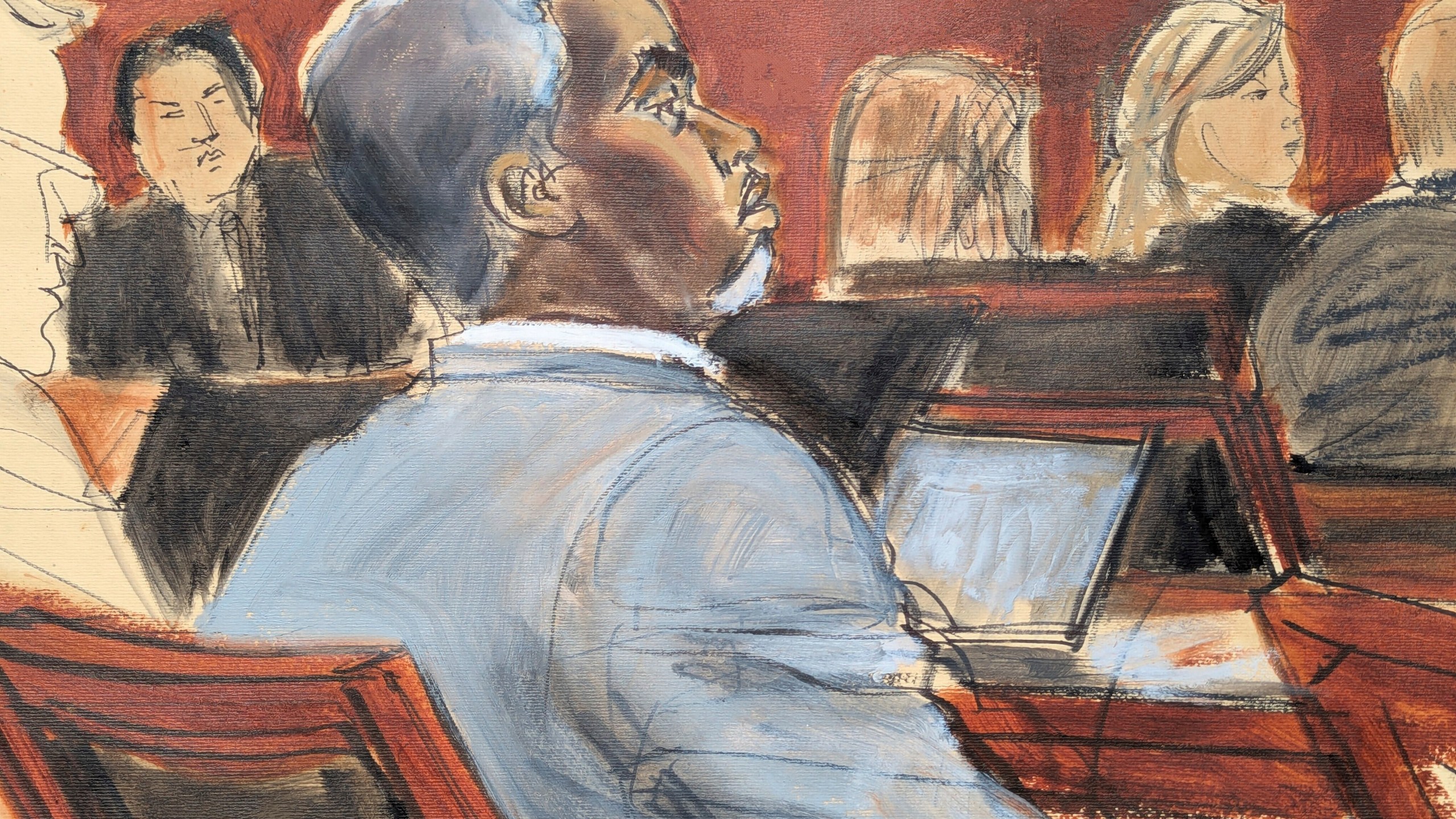 Sean Diddy Combs listens during opening statements on the first day of trial in Manhattan federal court, Monday, May 12, 2025, in New York. (Elizabeth Williams via AP)