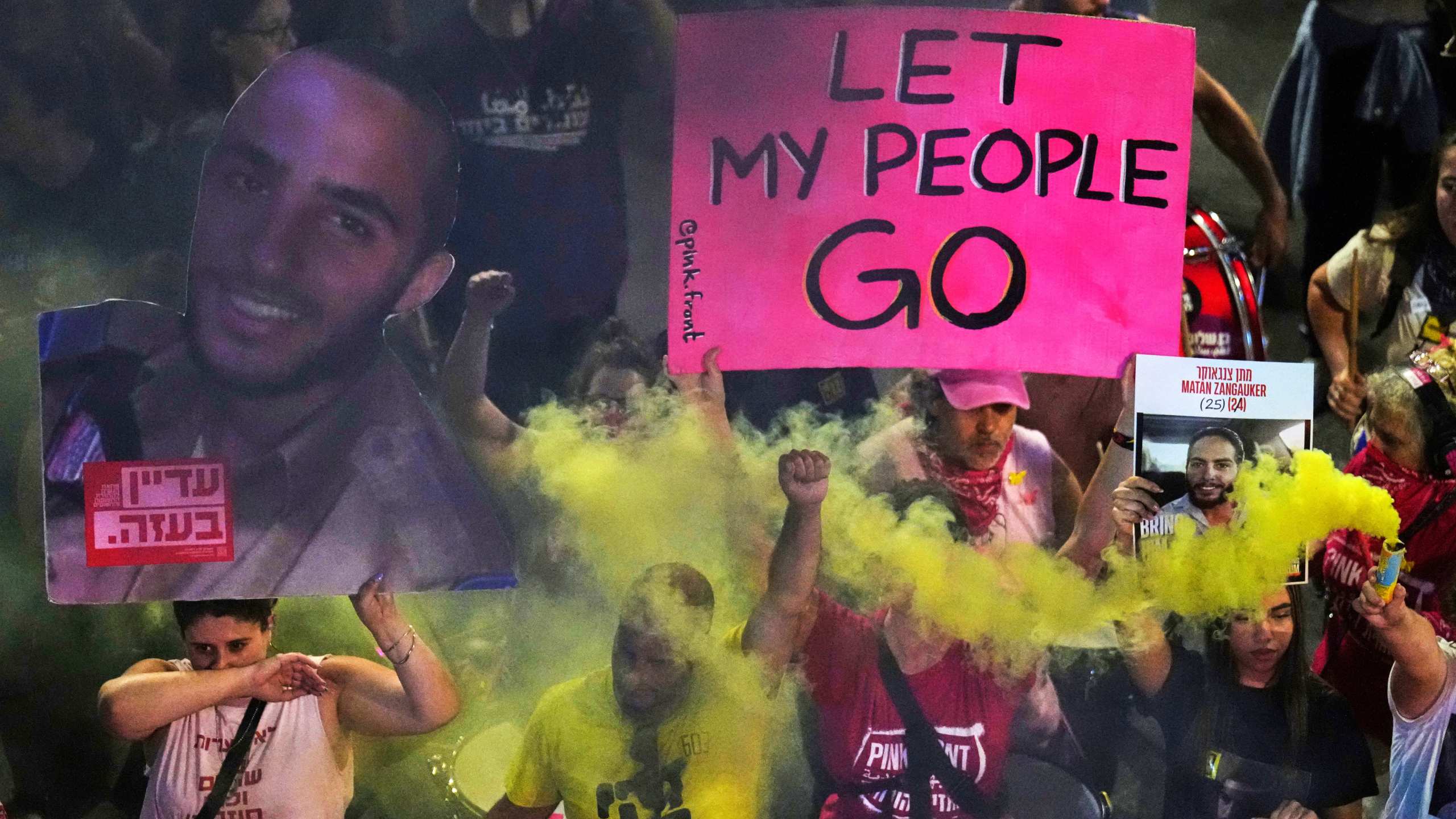 People take part in a protest demanding the end of the war and immediate release of hostages held by Hamas in the Gaza Strip, and against Prime Minister Benjamin Netanyahu's government, in Tel Aviv, Saturday, May 31, 2025. (AP Photo/Ariel Schalit)