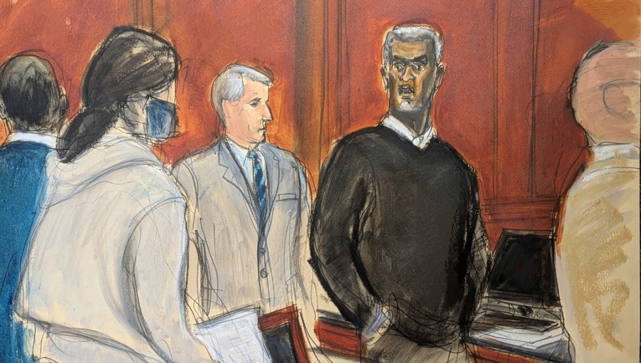 A courtroom rendering of Sean "Diddy" Combs, right, looking at jurors as they file into the jury box