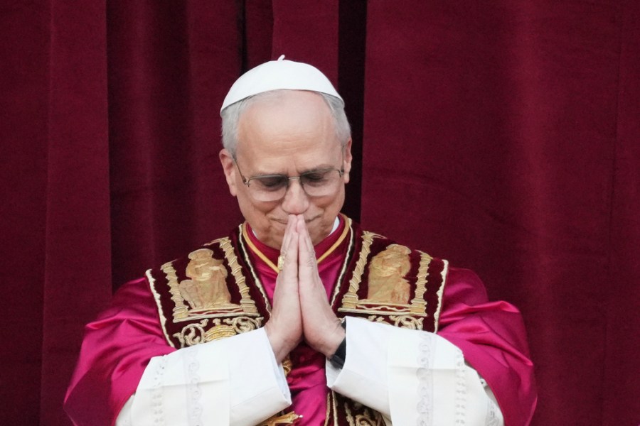 Pope Leo XIV holds his hands in prayer
