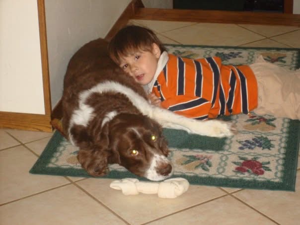 Child Jonathan Hoang with  dog