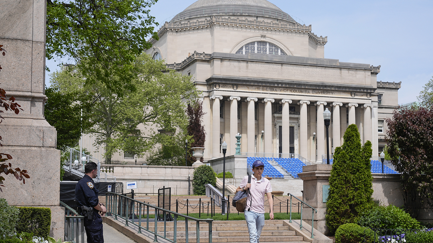 A New York City police officer keeps watch on campus