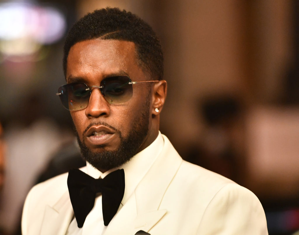 Diddy in a white suit at a gala