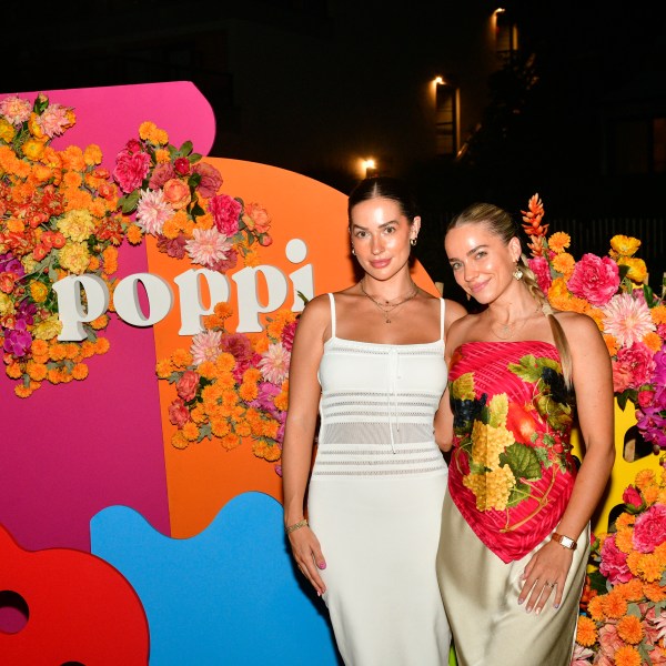 Avery Woods and Emilie Kiser attend an event