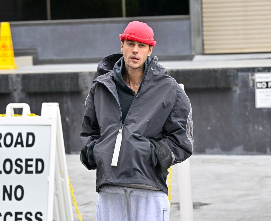 Justin Bieber with stocking cap, hands in pockets