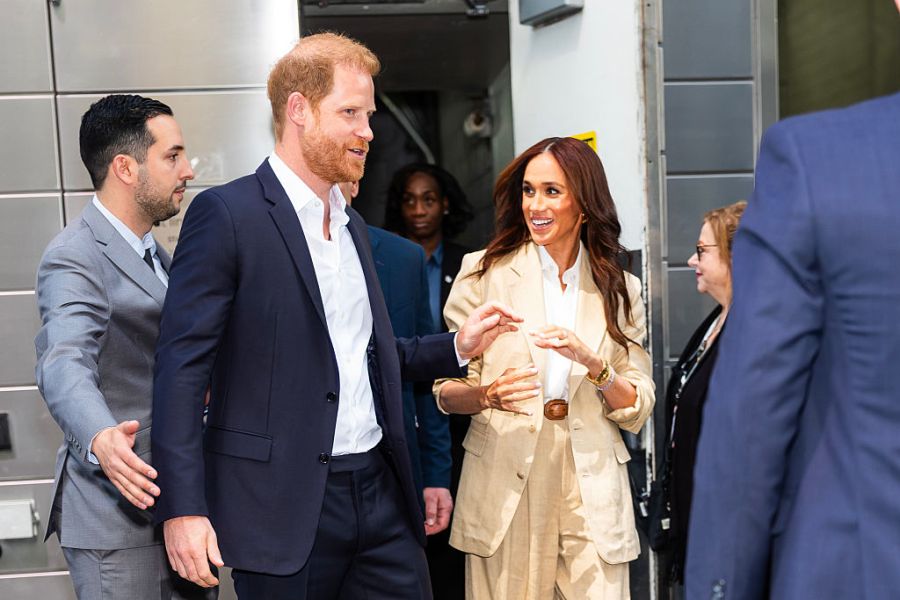 Prince Harry and Meghan attend an event
