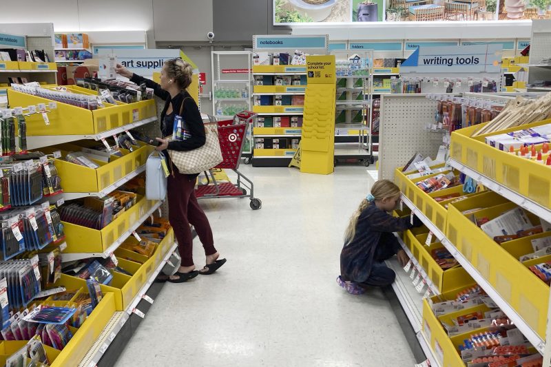 A parent shops for school supplies