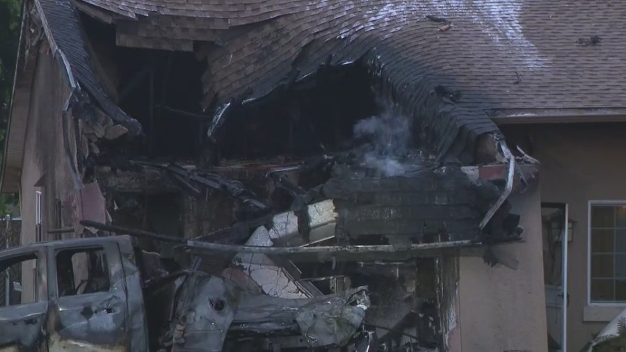 Plane crashes into neighborhood