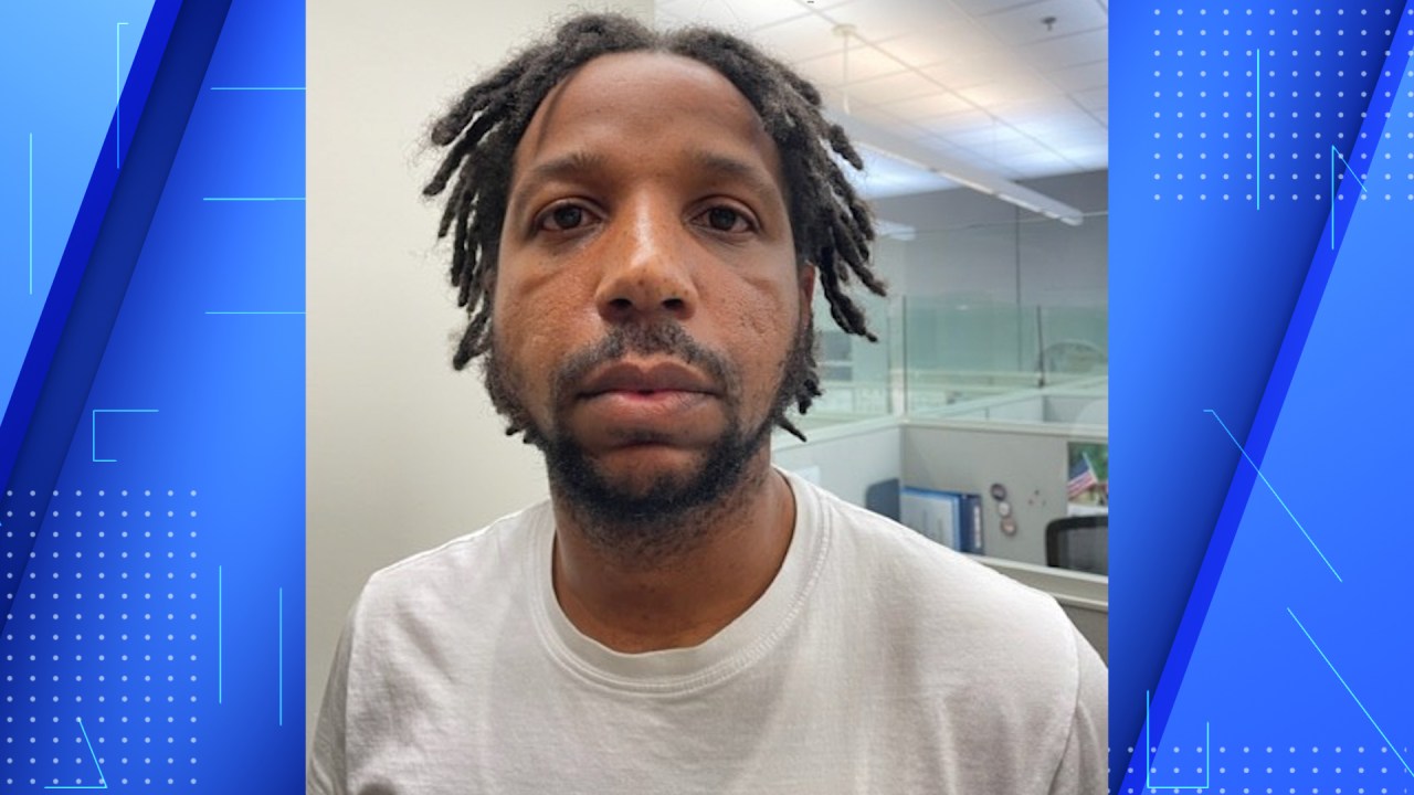 The man suspected of helping 10 inmates escape the New Orleans jail looks into the camera