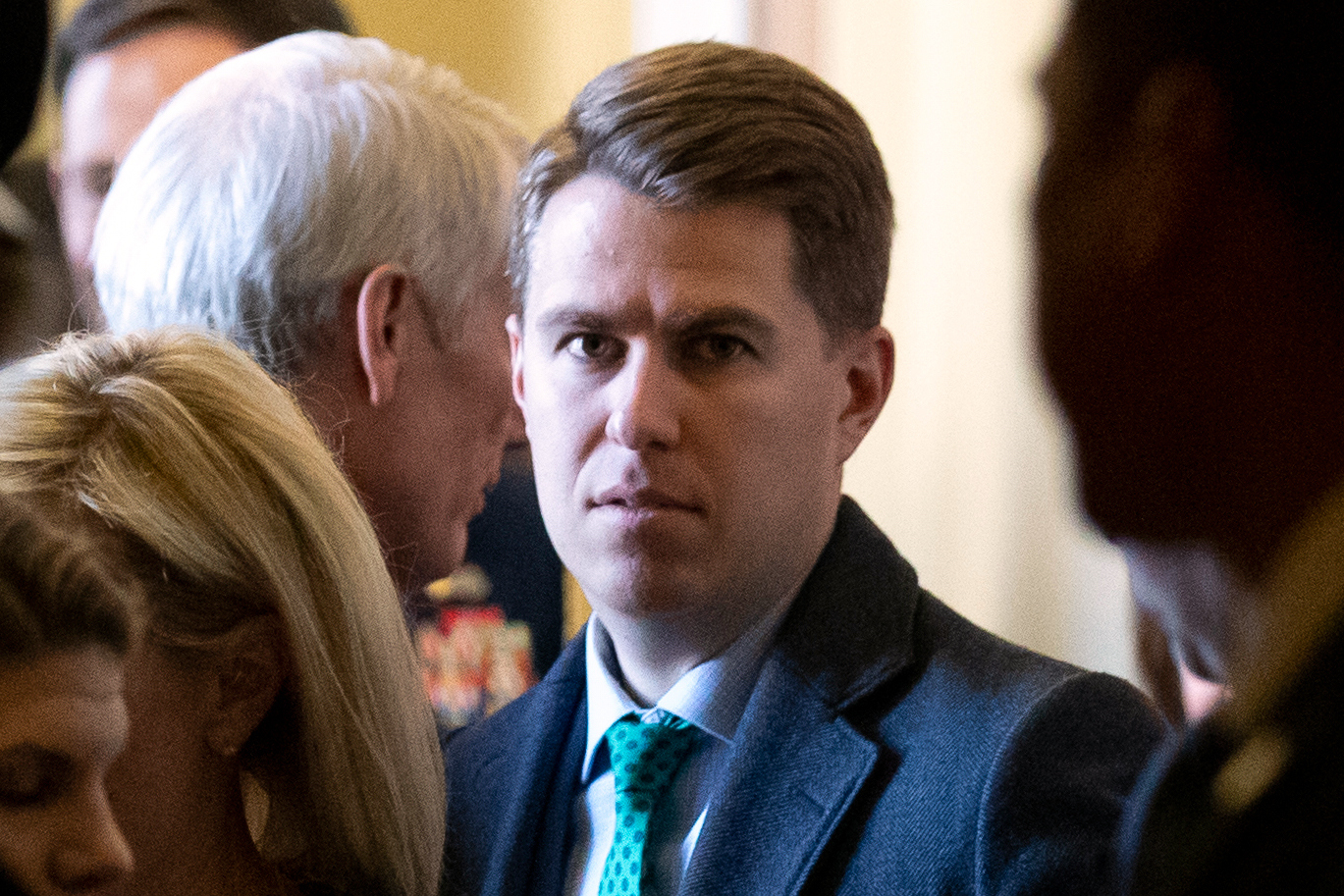 FILE - Homeland Security official Miles Taylor, center, departs after the Republican Caucus luncheon on Capitol Hill, March 5, 2019, in Washington. (AP Photo/Alex Brandon, File)