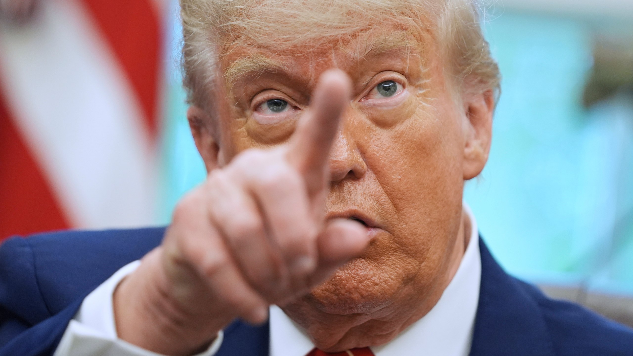 FILE - President Donald Trump gestures as he speaks with reporters in the Oval Office of the White House, May 8, 2025, in Washington. (AP Photo/Evan Vucci, FIle)