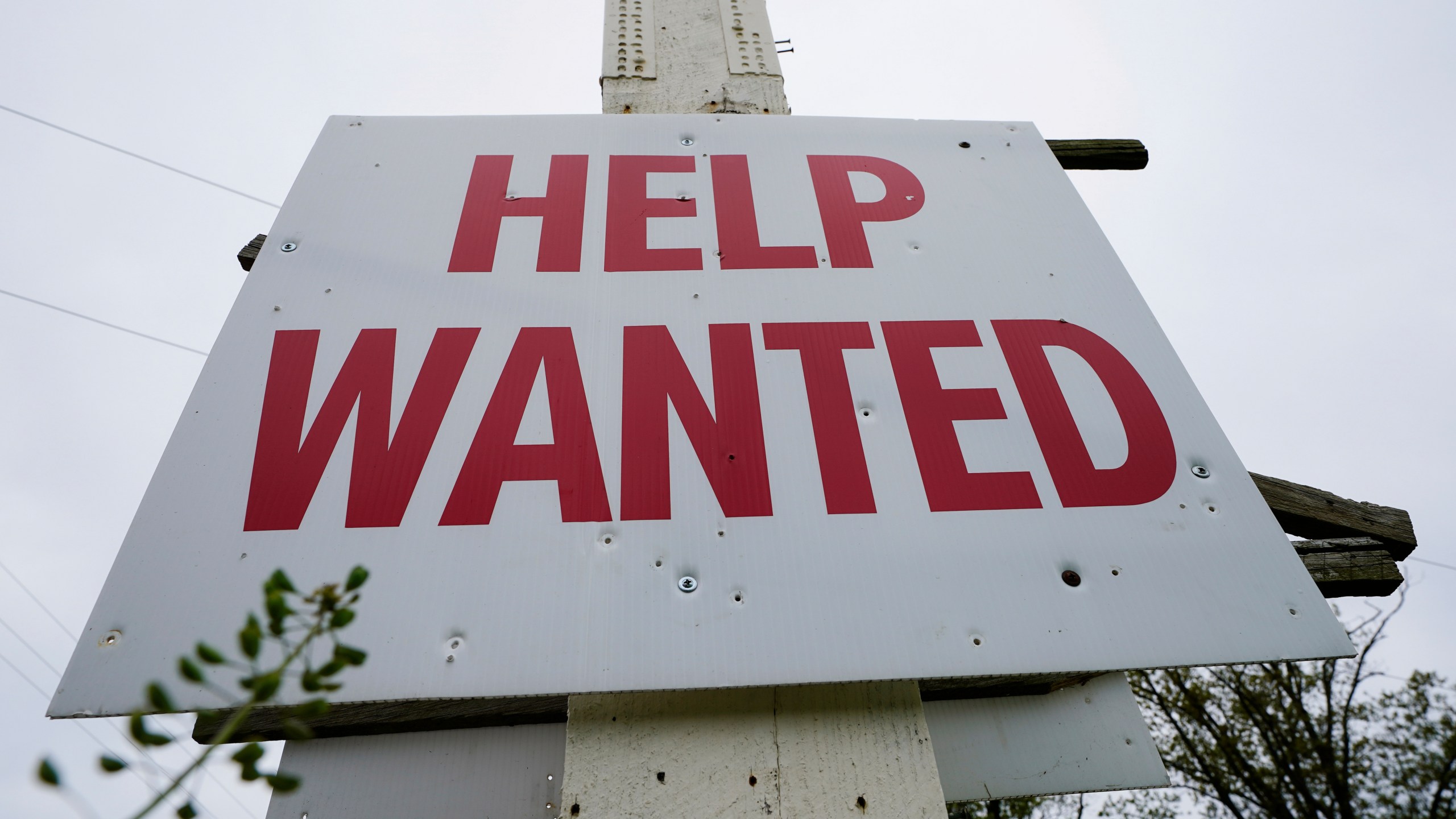 FILE - A help wanted sign is posted in Lansdale, Pa., Friday, April 28, 2023. (AP Photo/Matt Rourke, File)