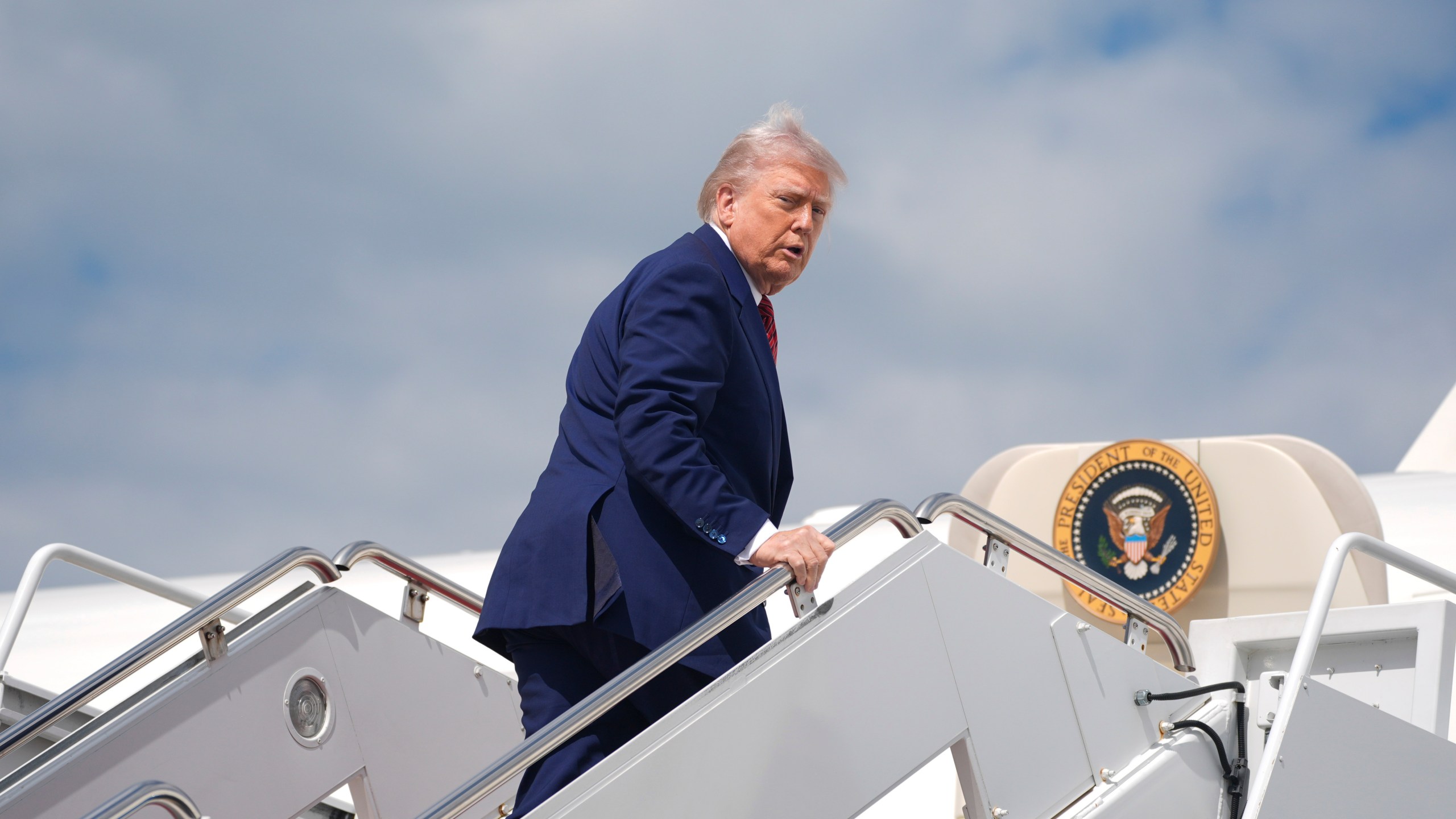 President Donald Trump boards Air Force One to depart Joint Base Andrews, Md., Friday, May 23, 2025. (AP Photo/Manuel Balce Ceneta)
