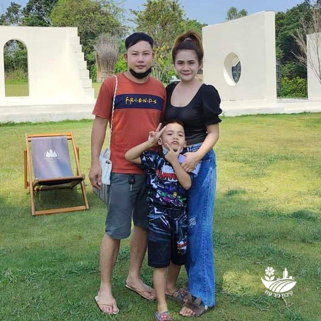This undated photo provided by the Hostage's Family Forum shows Nattapong Pinta, with his wife and son. (Hostage's Family Forum via AP)