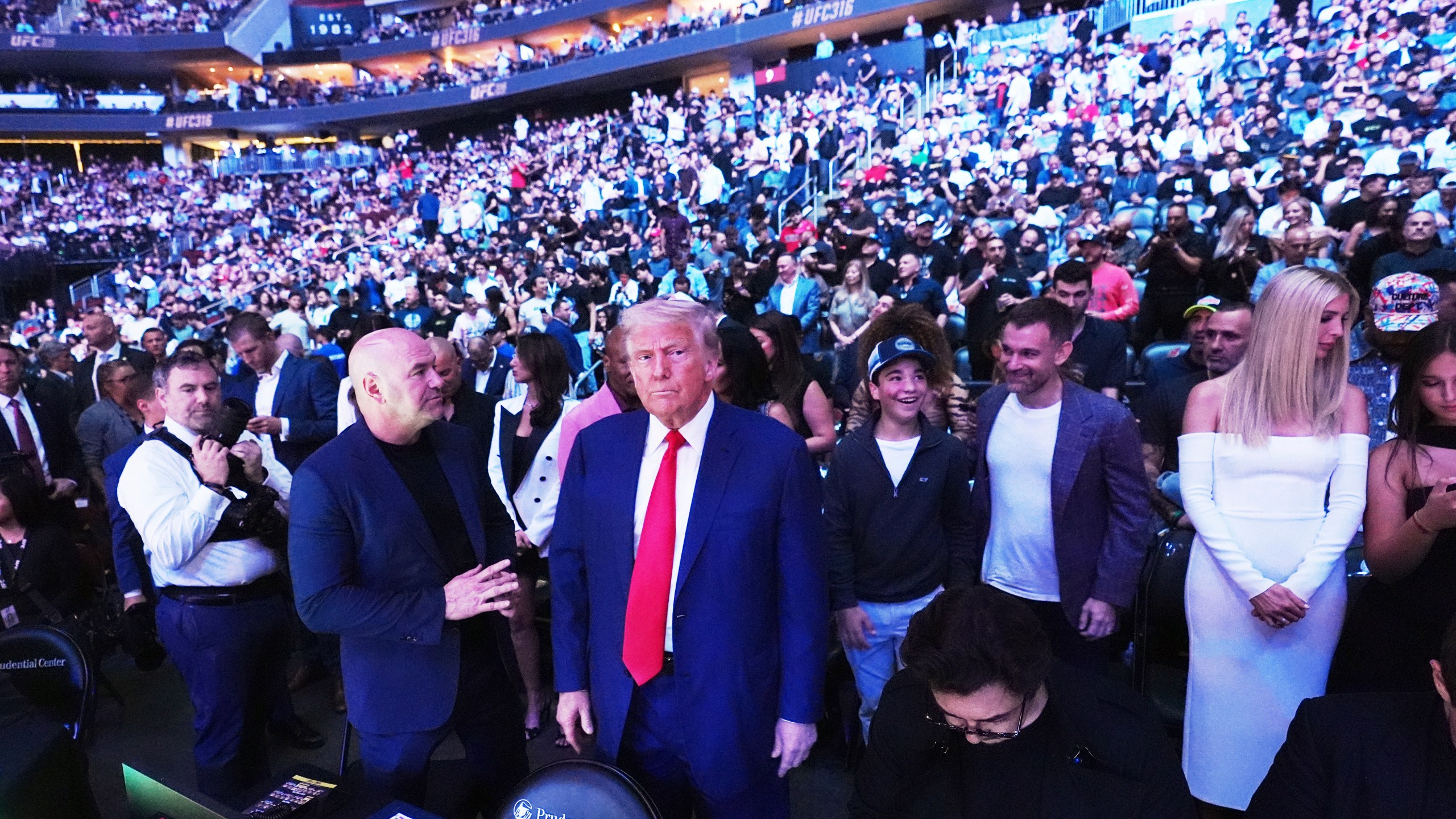 President Donald Trump attends the UFC-316 mixed martial arts event, at the Prudential Center, Saturday, June 7, 2025, in Newark, N.J., as UFC's Dana White, looks on. (AP Photo/Frank Franklin II)