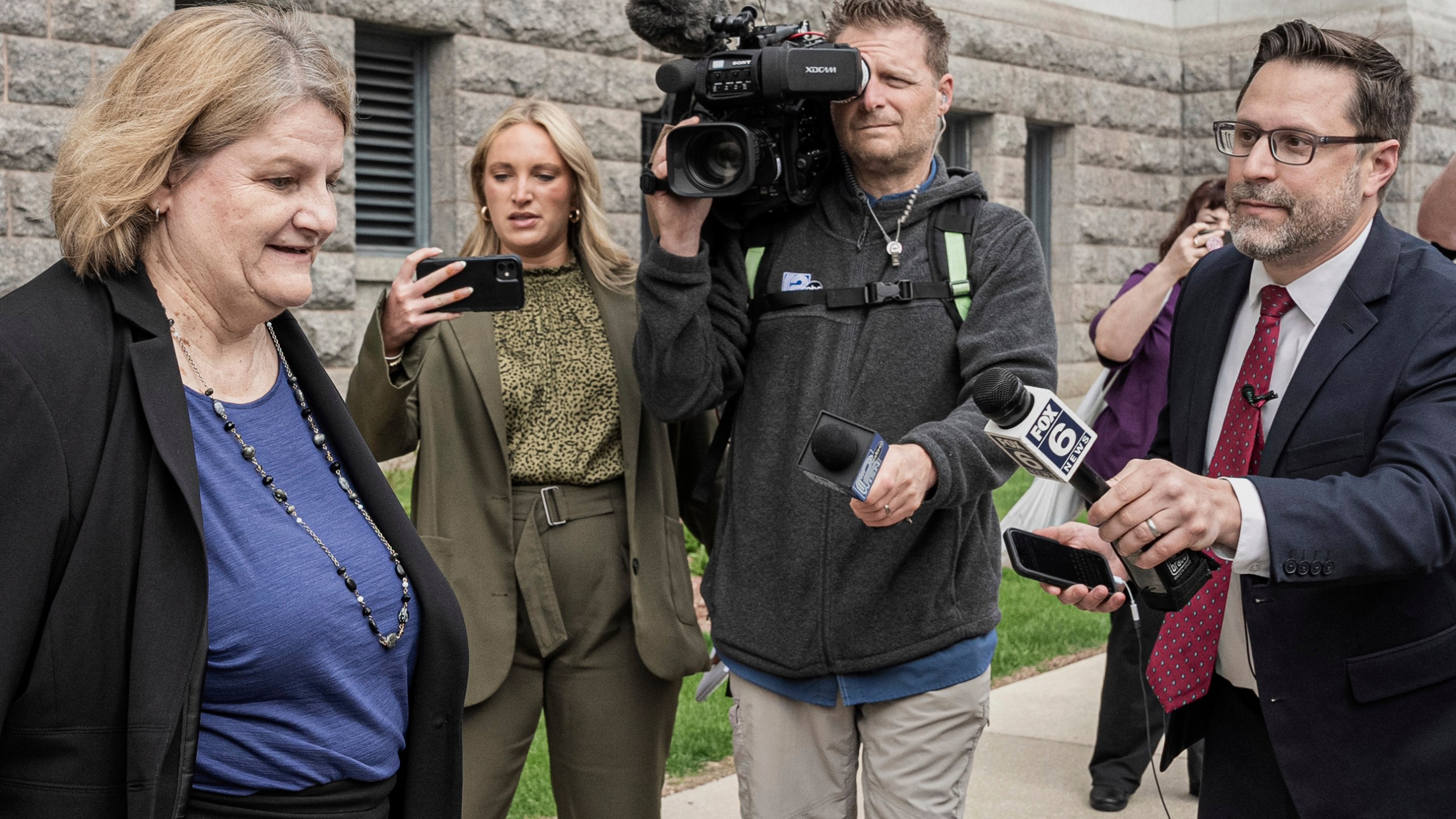 FILE - Milwaukee County Circuit Judge Hannah Dugan leaves the federal courthouse after a hearing Thursday, May 15, 2025, in Milwaukee. (AP Photo/Andy Manis, File)