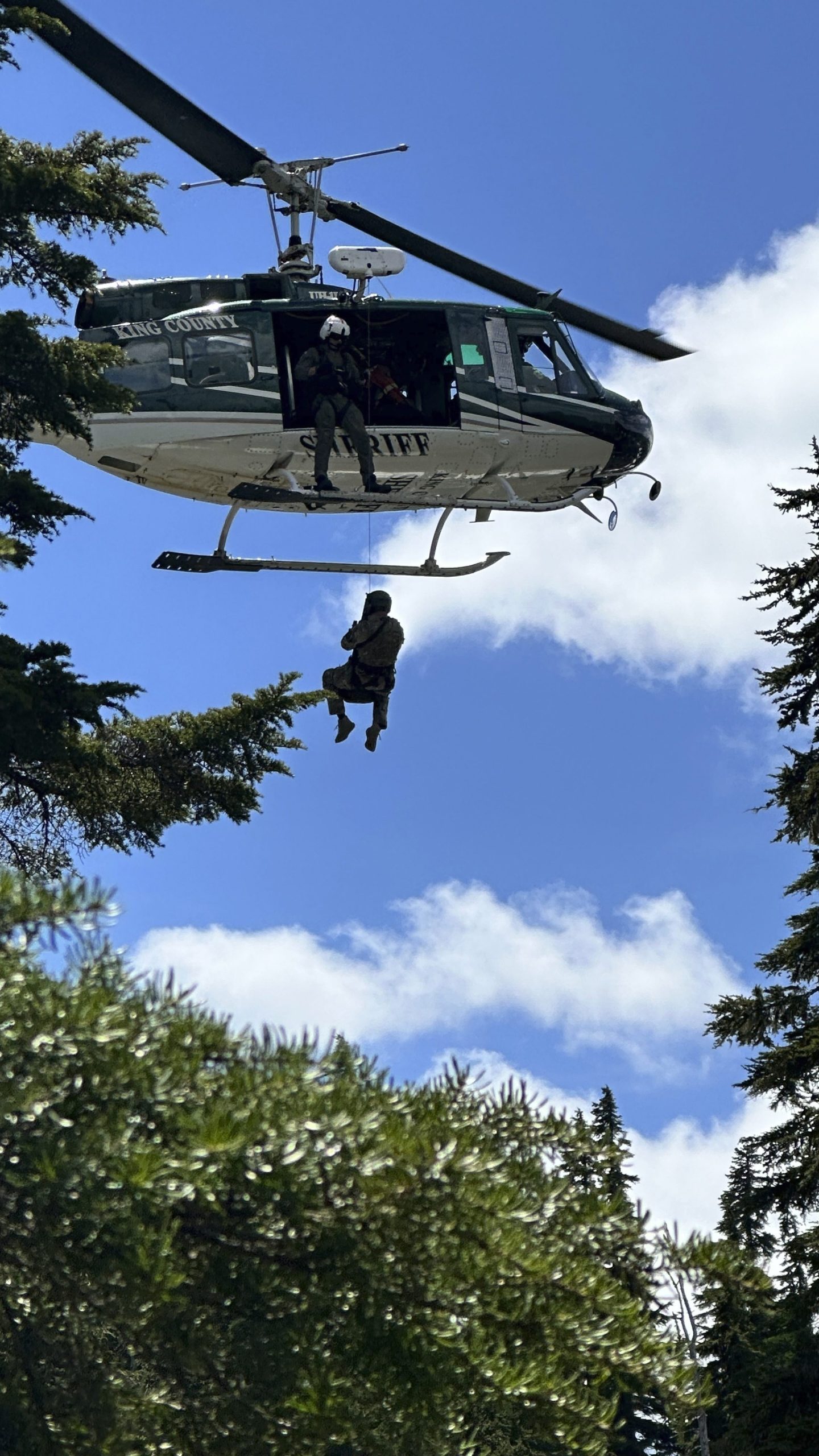 In this handout photo provided by the Snohomish County Sheriff's Office deputies participate in the search for Travis Decker, at an undisclosed location in Washington state, Friday, June 6, 2025. (Snohomish County Sheriff's Office photo via AP)