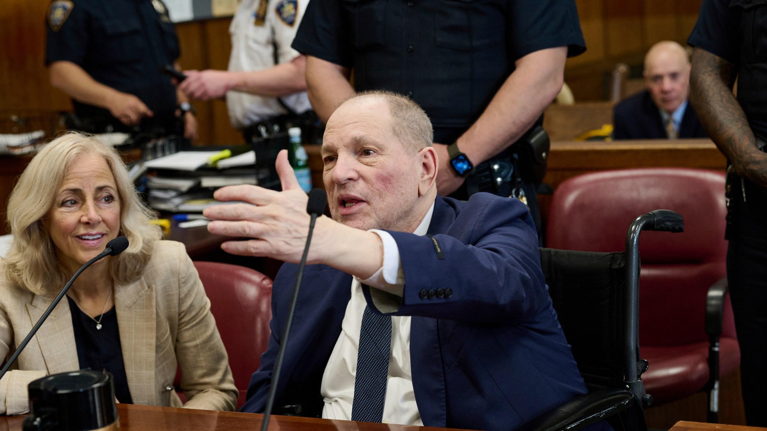 Harvey Weinstein jokes with press photographers in Manhattan criminal court as the jury in his retrial deliberates, Wednesday, June 11, 2025, in New York. Curtis Means/Pool Photo via AP)