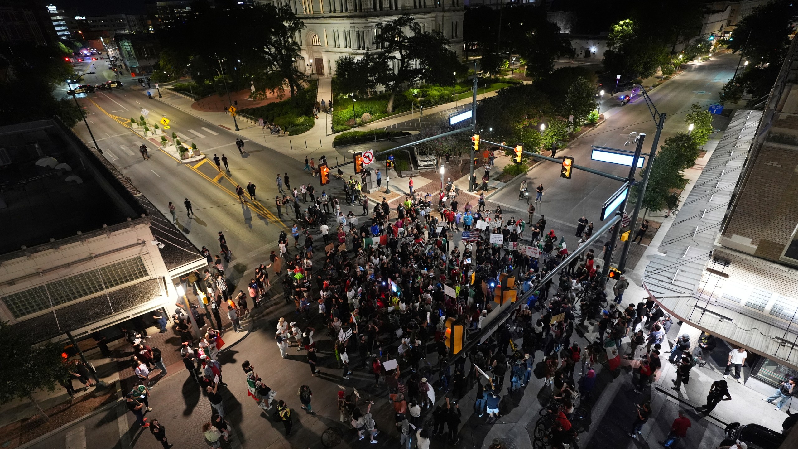 Anti ICE protesters gather in downtown San Antonio, Wednesday, June 11, 2025. (AP Photo/Eric Gay)