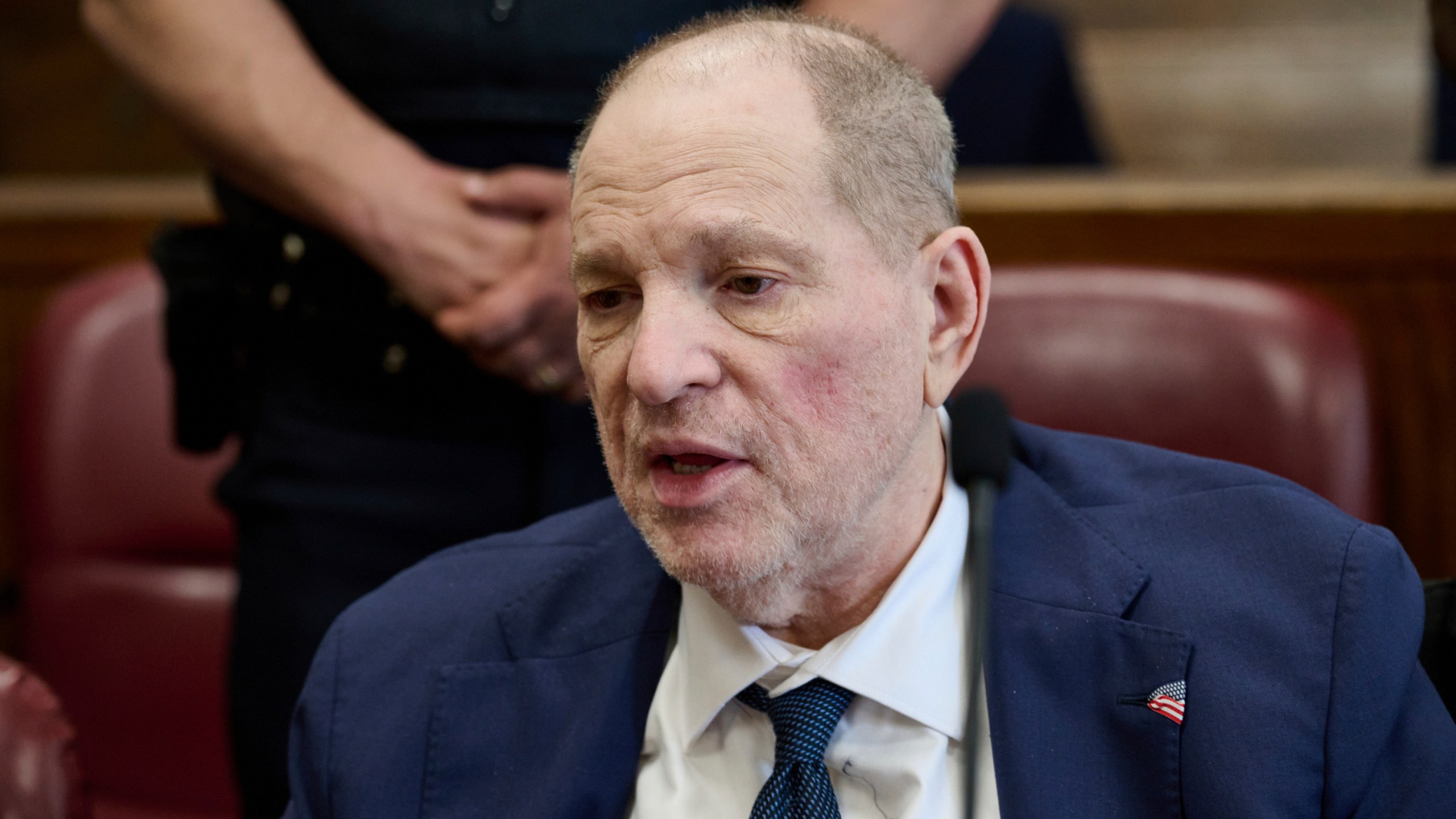 Harvey Weinstein jokes with press photographers in Manhattan criminal court as the jury in his retrial deliberates, Wednesday, June 11, 2025, in New York. Curtis Means/Pool Photo via AP)