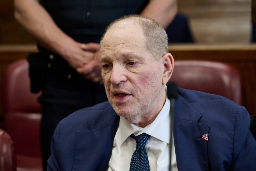 Harvey Weinstein jokes with press photographers in Manhattan criminal court as the jury in his retrial deliberates, Wednesday, June 11, 2025, in New York. Curtis Means/Pool Photo via AP)