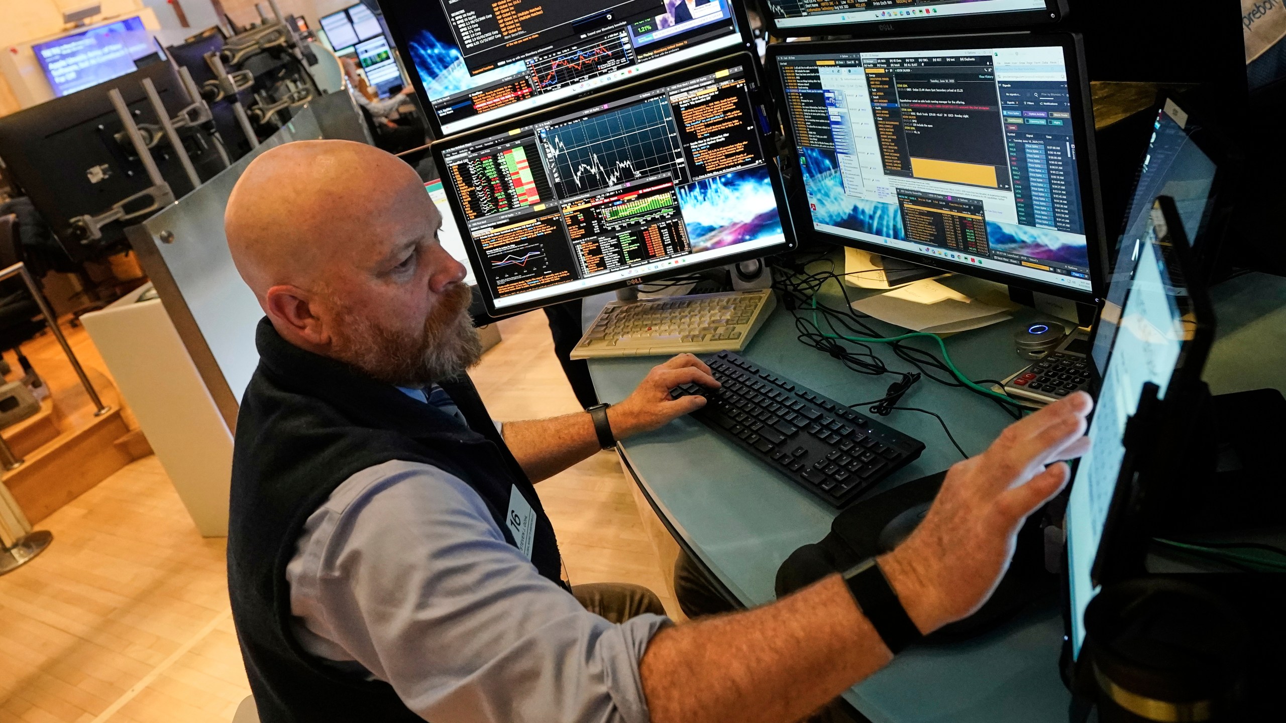 Trader Steven Gohl works on the floor of the New York Stock Exchange, Tuesday, June 10, 2025. (AP Photo/Richard Drew)