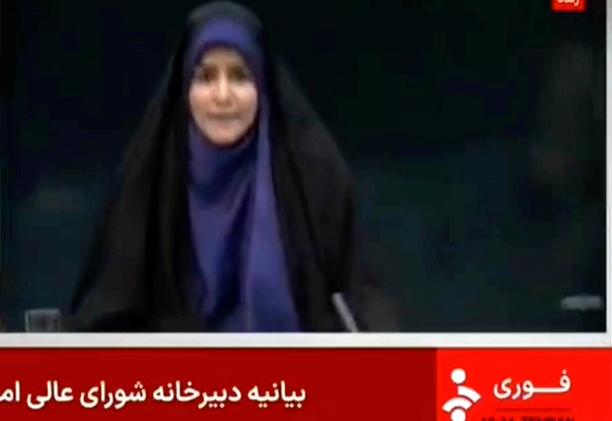 This frame grab from a video released by Iran state TV shows anchor Sahar Emami amid an explosion from an Israeli attack during a live TV broadcast, June 16, 2025, in Tehran, Iran. (Iran state TV, IRINN via AP)