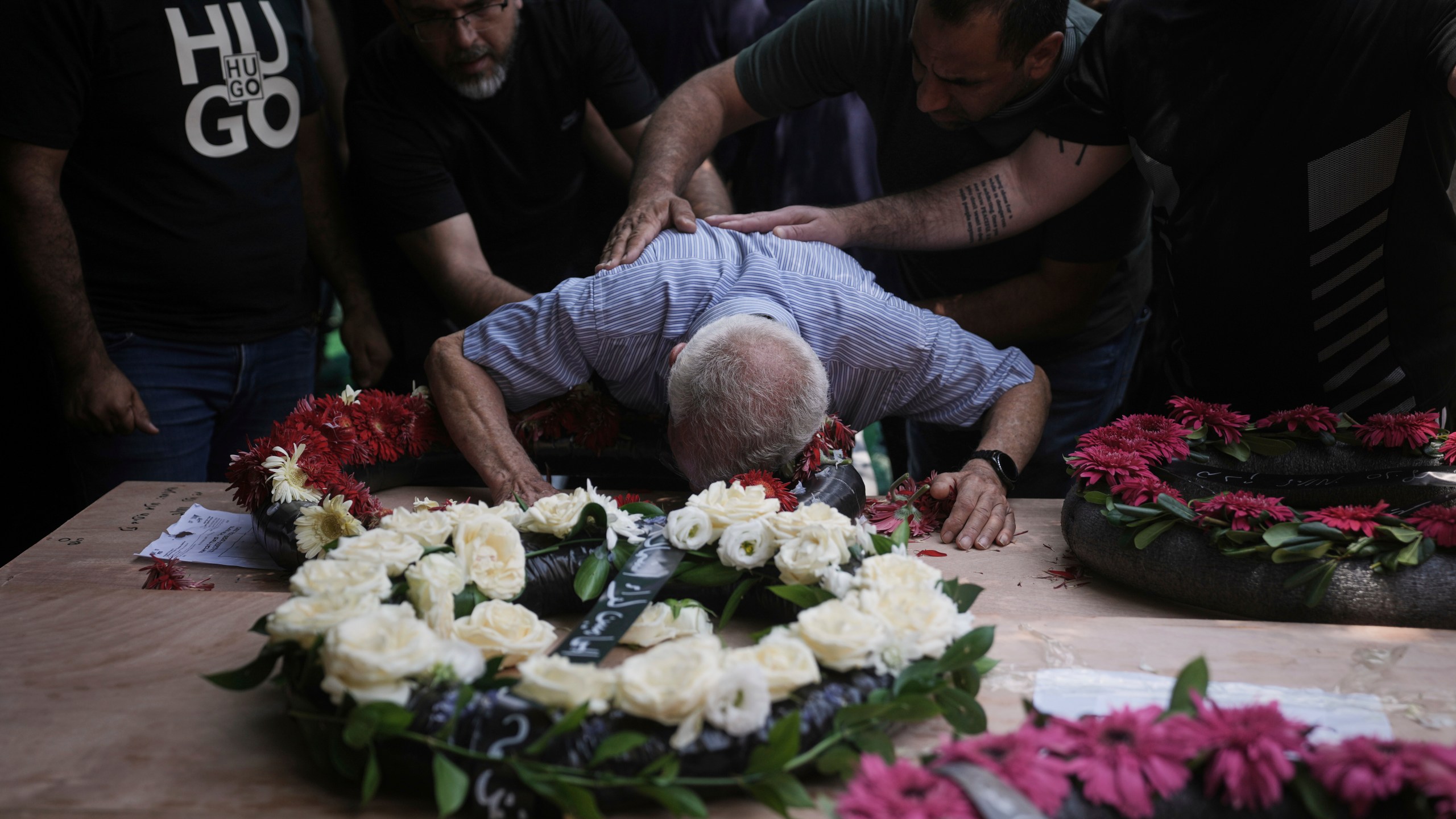 Relatives attend the funeral of four members of the Khatib family, Palestinian citizens of Israel killed in an Iranian missile strike on Tamra, Israel, on Tuesday, June 17, 2025. (AP Photo/Mahmoud Illean)