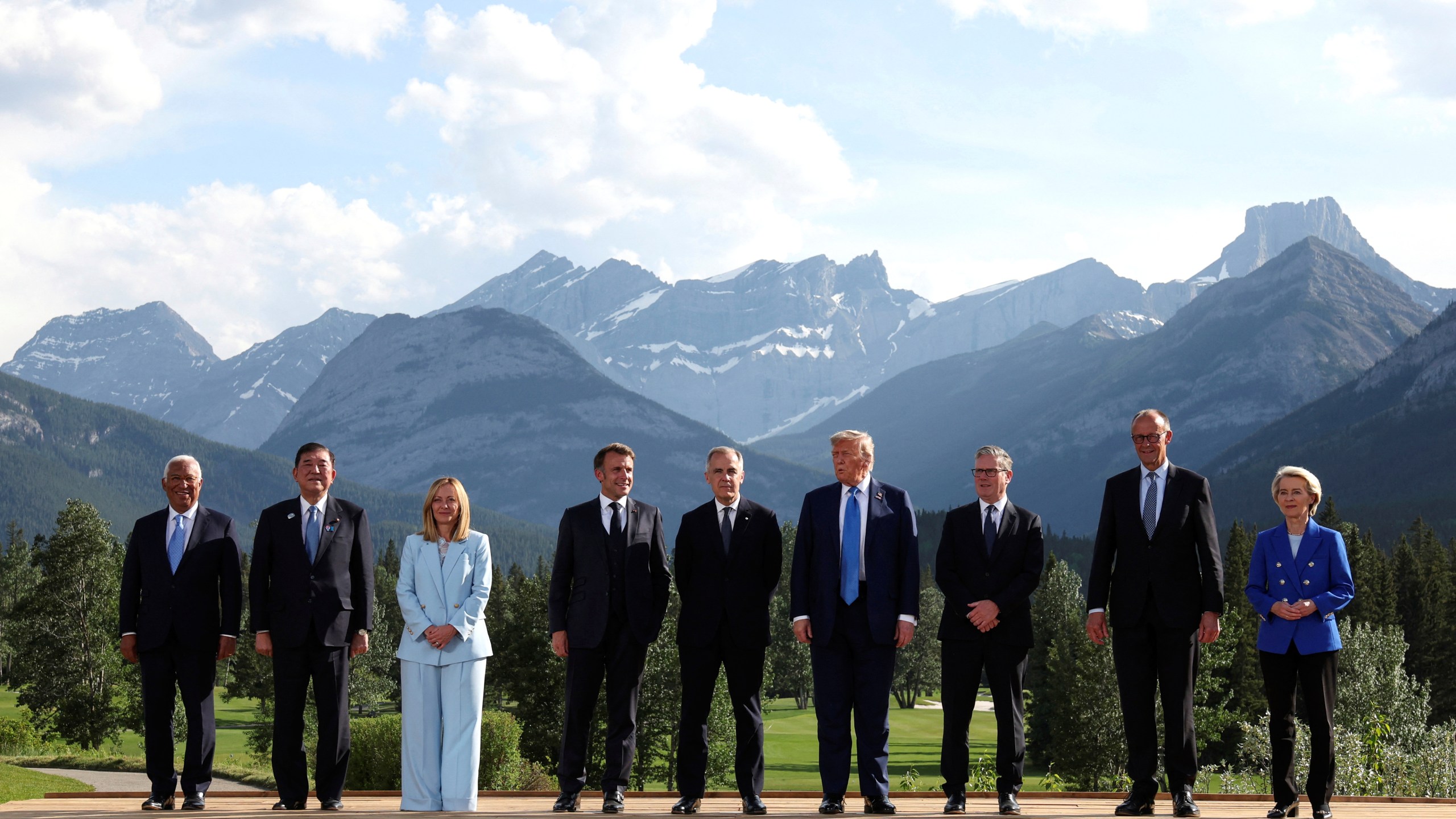 European Council President Antonio Costa, from left, Japan's Prime Minister Shigeru Ishiba, Italian Prime Minister Giorgia Meloni, French President Emmanuel Macron, Canada's Prime Minister Mark Carney, U.S. President Donald Trump, Britain's Prime Minister Keir Starmer, German Chancellor Friedrich Merz and European Commission President Ursula von der Leyen pose for a family photo during the G7 Summit, in Kananaskis, Alberta, Monday, June 16, 2025. (Suzanne Plunkett/Pool Photo via AP)