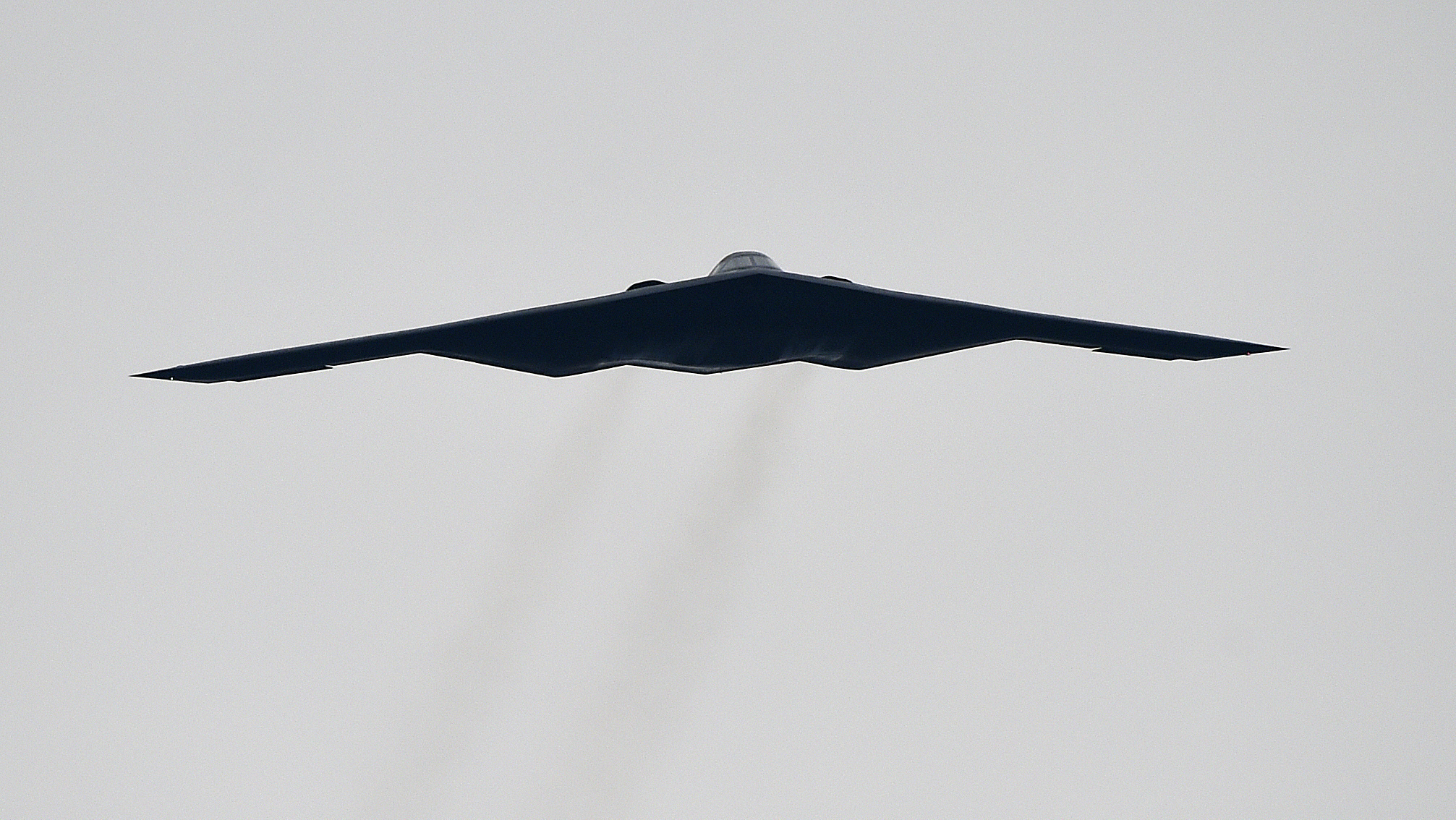 FILE - In this Oct. 25, 2015, file photo, a U.S. Air Force B2 Spirit stealth bomber performs a flyover at the Talladega Superspeedway in Talladega, Ala.(AP Photo/Mark Almond, File)