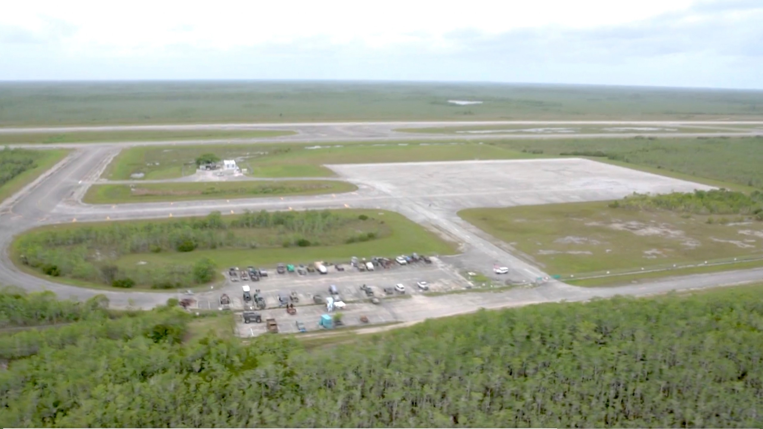 In this image from undated video released by the Office of Attorney General James Uthmeier shows an isolated Everglades airfield about 45 miles (72 kms.) west of Miami that Florida officials said an immigration detention facility dubbed "Alligator Alcatraz" is just days away from being operational. (Courtesy of the Office of Attorney General James Uthmeier via AP)