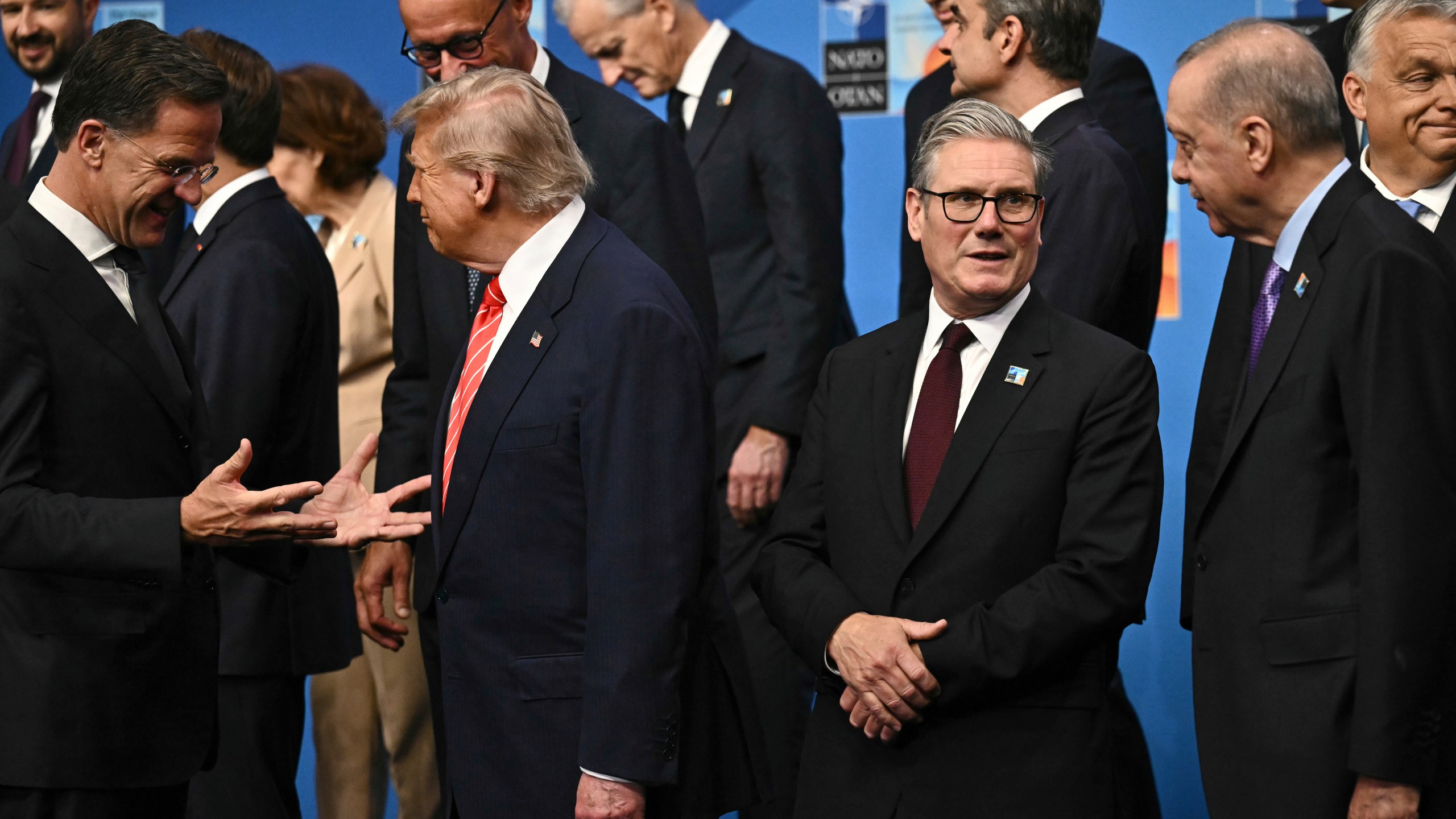 NATO Secretary General Mark Rutte, from left, President Donald Trump, Britain's Prime Minister Keir Starmer and Turkey's President Recep Tayyip Erdogan gather with NATO country leaders for a family photo during the NATO summit in The Hague, Netherlands, Wednesday, June 25, 2025. (Ben Stansall/Pool Photo via AP)