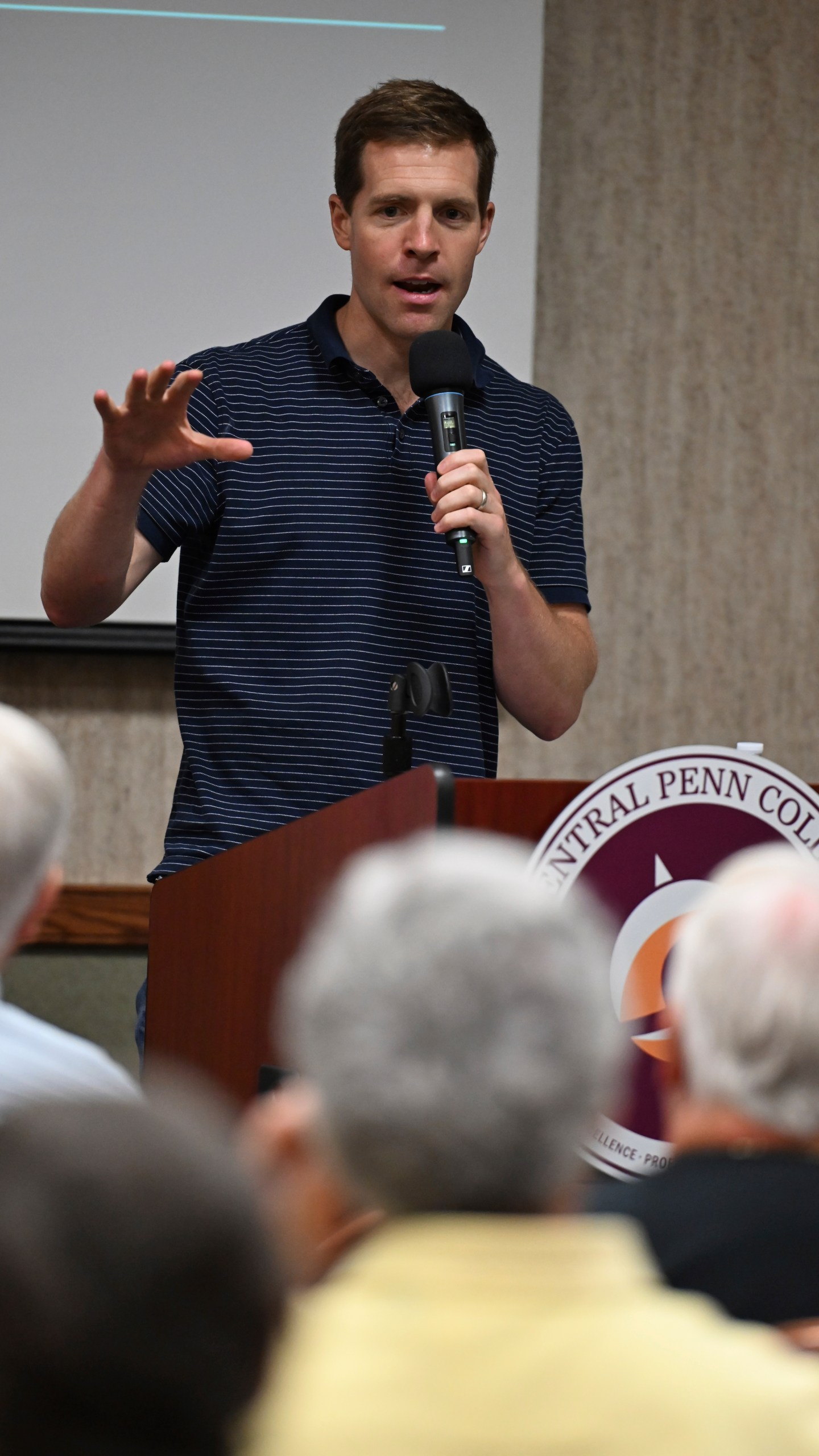 Conor Lamb speaks to the crowd at a town hall-style event organized by progressive groups at Central Penn College, Sunday, June 22, 2025, in Enola, Pa. (AP Photo/Marc Levy)