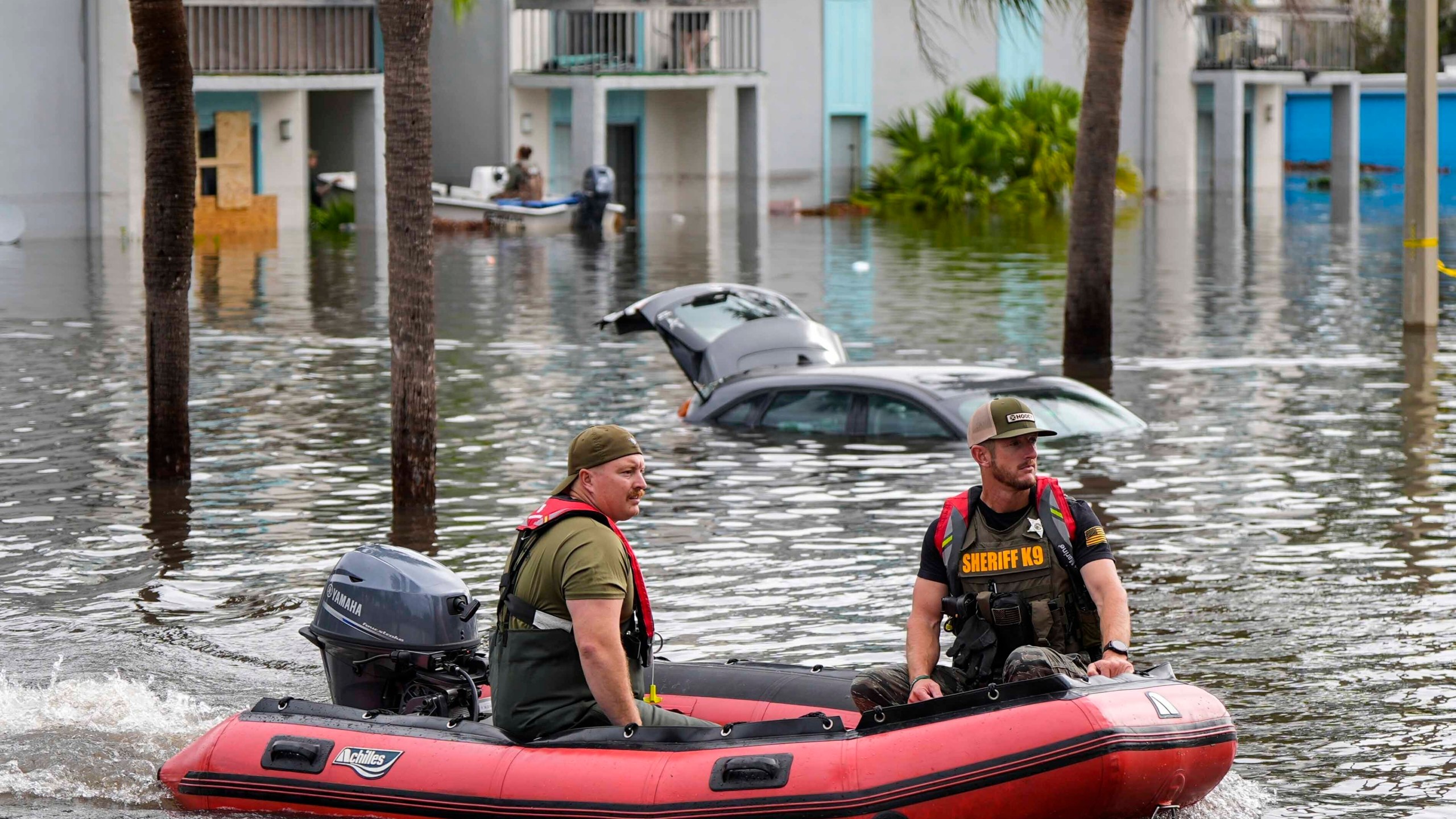 FILE - A water rescue boat moves in floodwaters at an apartment complex in the aftermath of Hurricane Milton, Oct. 10, 2024, in Clearwater, Fla. (AP Photo/Mike Stewart, File)