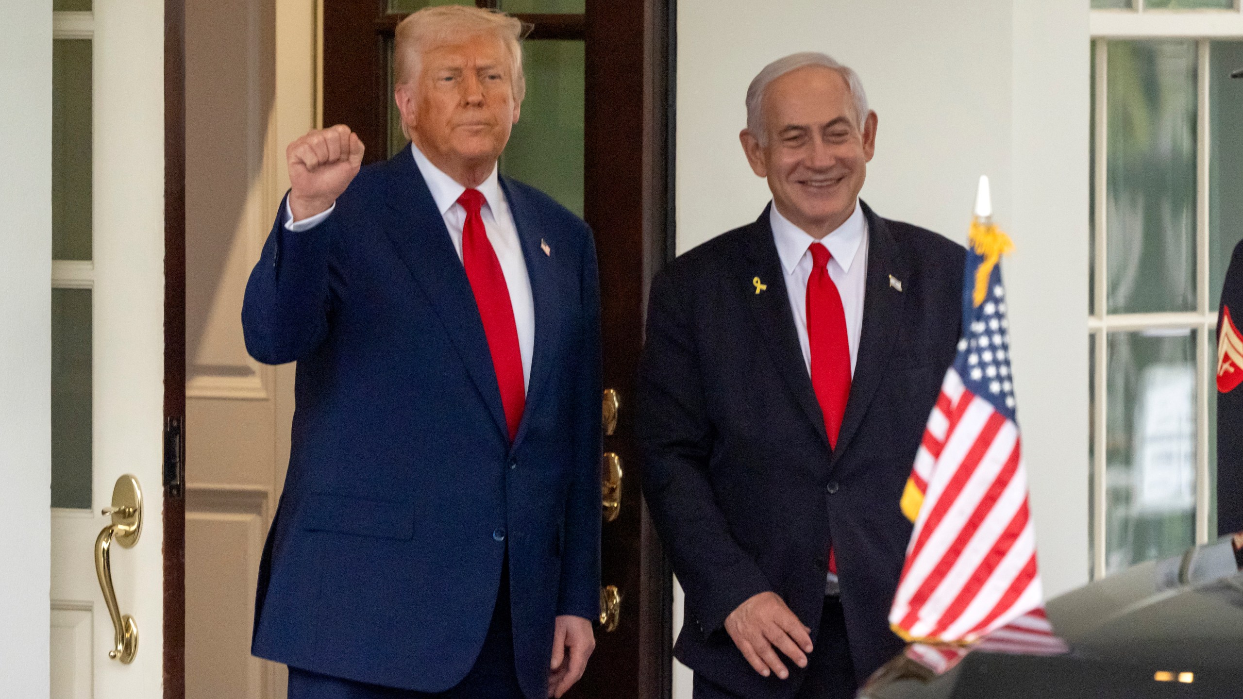 FILE - President Donald Trump, left, stands with Israel's Prime Minister Benjamin Netanyahu at the West Wing of the White House, April 7, 2025, in Washington. (AP Photo/Mark Schiefelbein, File)
