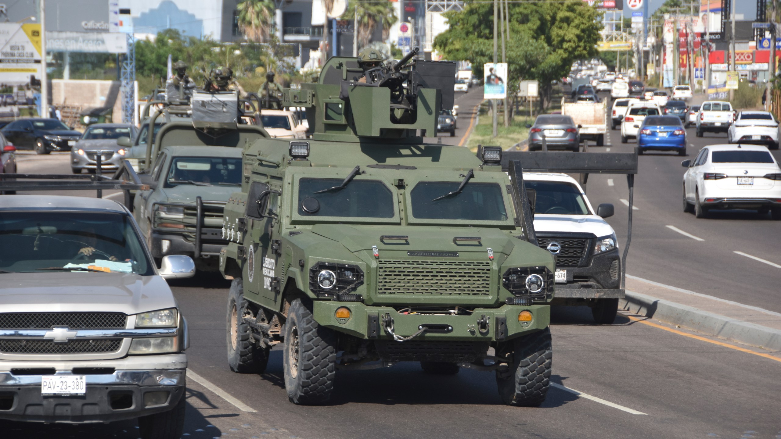 an armored vehicle patrols the streets in Mexico