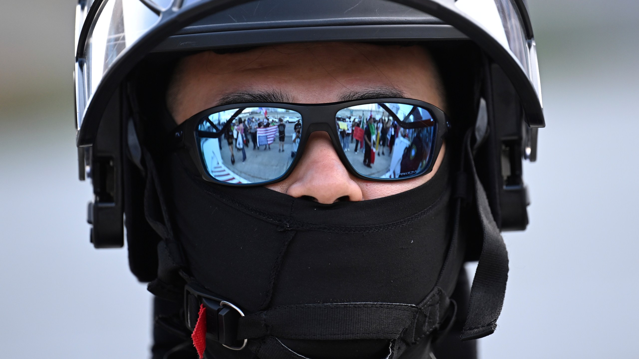 FILE - A U.S. Customs and Border Patrol agent looks on during a protest outside the Federal Building on June 13, 2025, in Los Angeles. (AP Photo/Wally Skalij, file)