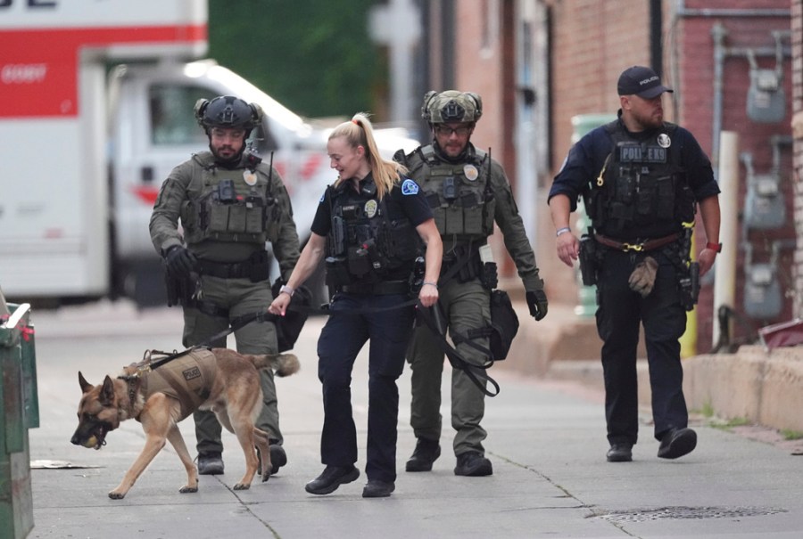 police work the scene after an attack in Colorado