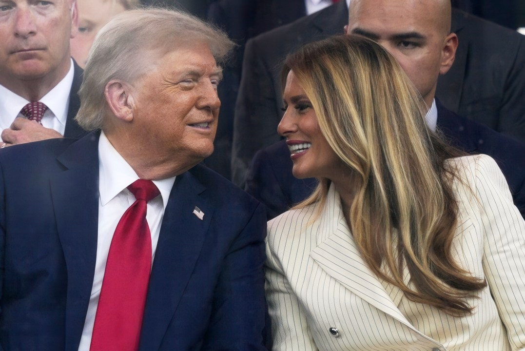 Trump and Melania attend a military parade