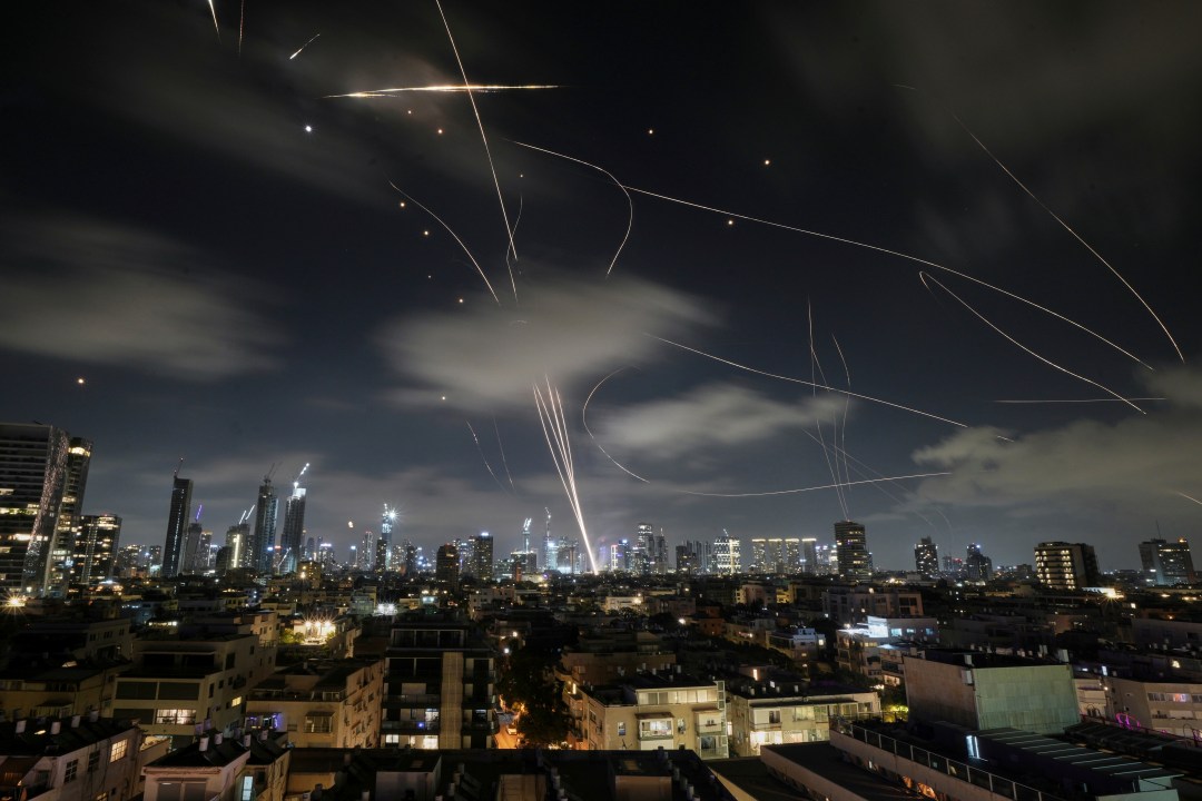 The Israeli Iron Dome air defense system fires to intercept missiles