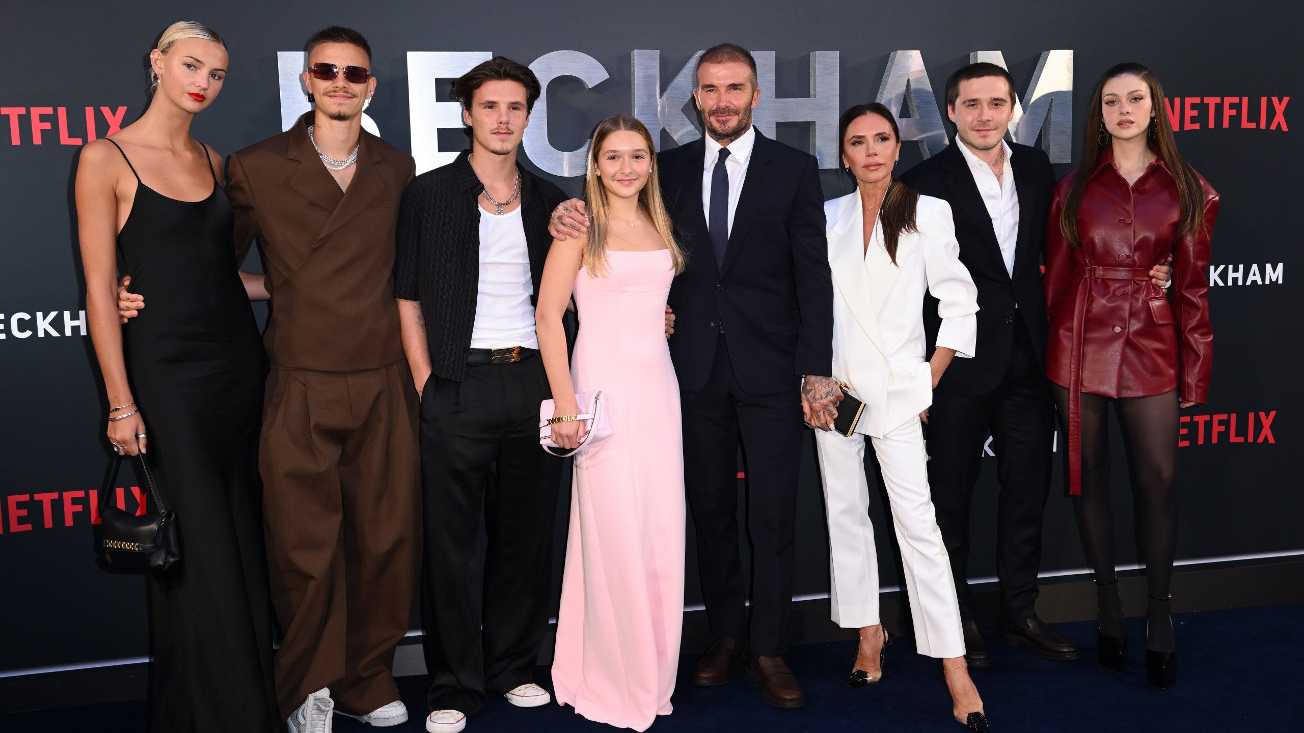 Beckham family poses for photos at an event